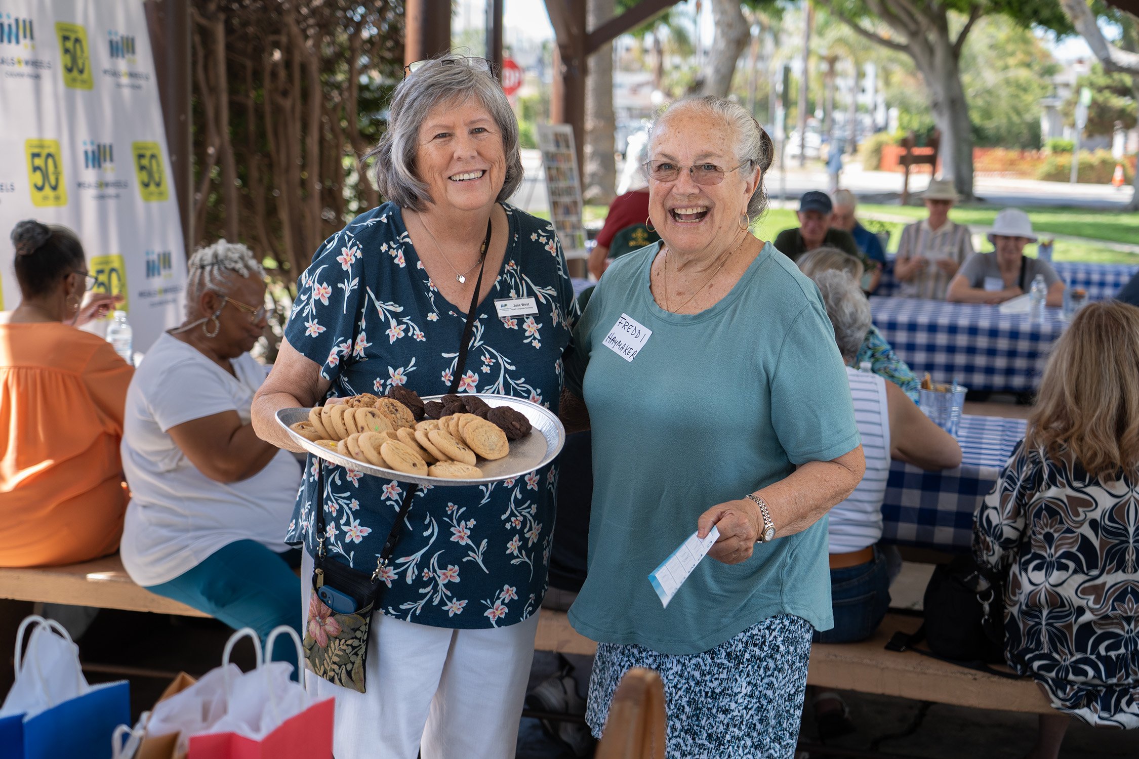 julie handing another prize to Freddi the cookies.jpg