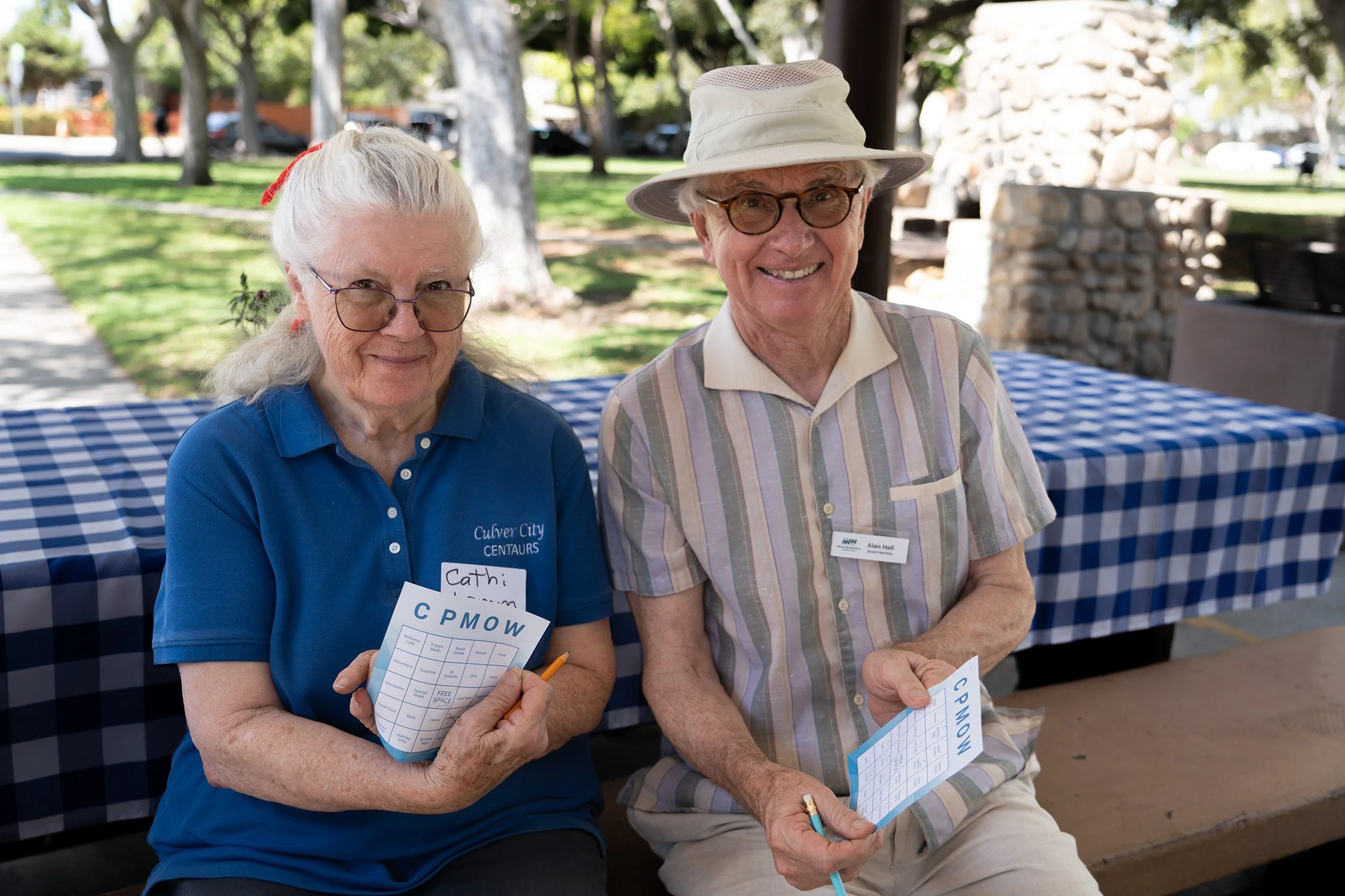 Kathi Lamm Volunteer Packer and Alan Hall board member.jpg