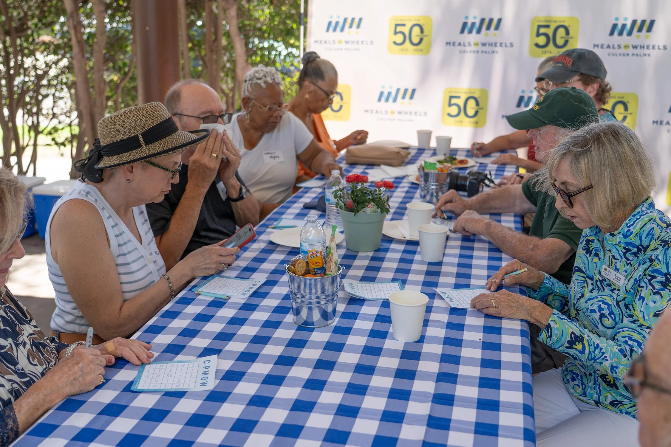 Volunteers play CPMOW Bingo.jpg