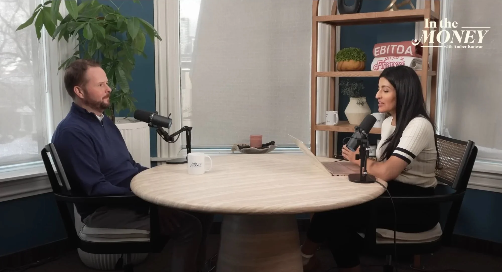 In the Money with Amber Kanwar studio recording setup with host and guests at table