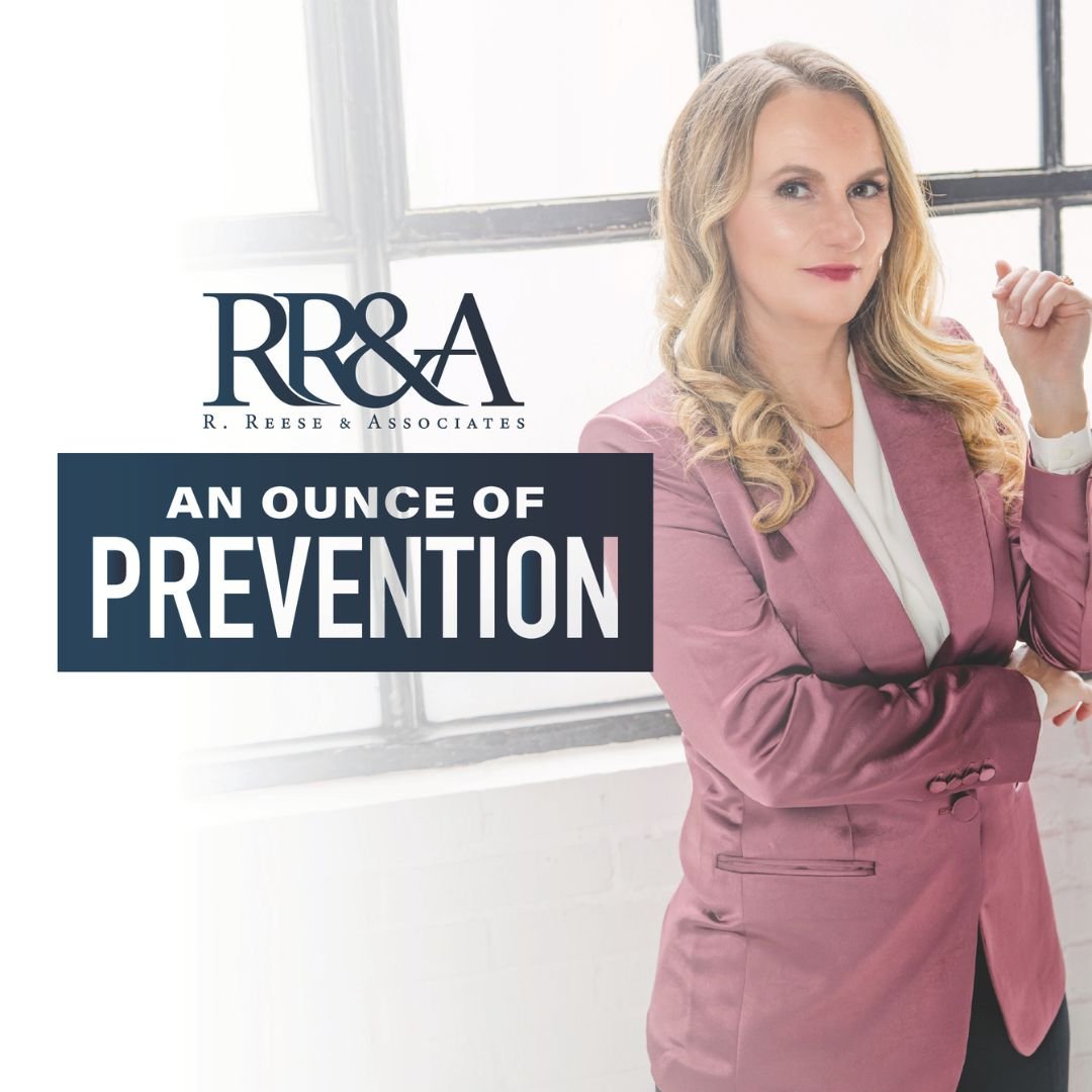 A woman with blonde hair in a pink blazer and white blouse, standing indoors by a window, with text overlay reading 'RR&A R. Reese & Associates, An Ounce of Prevention'.