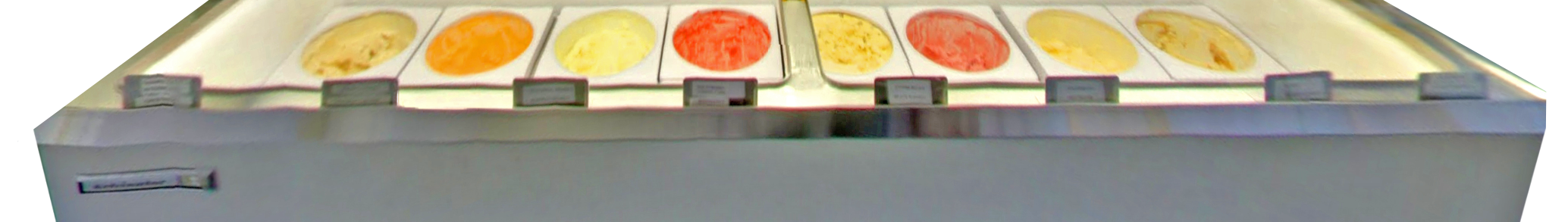 Ice cream flavors in a freezer, including orange, yellow, red, and other colored ice creams.