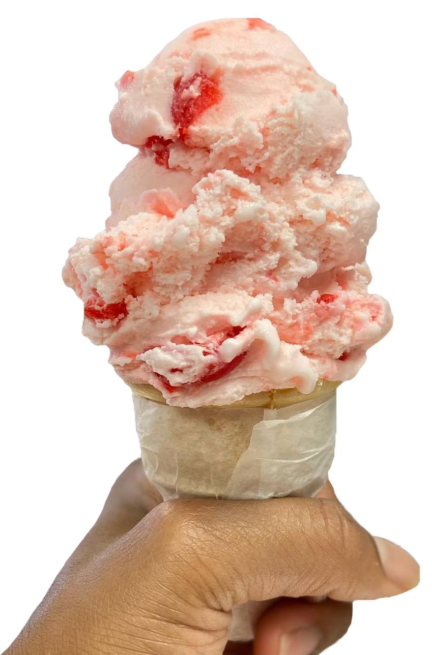 Hand holding a cup of strawberry ice cream cone with pink-colored ice cream and red fruit swirls.