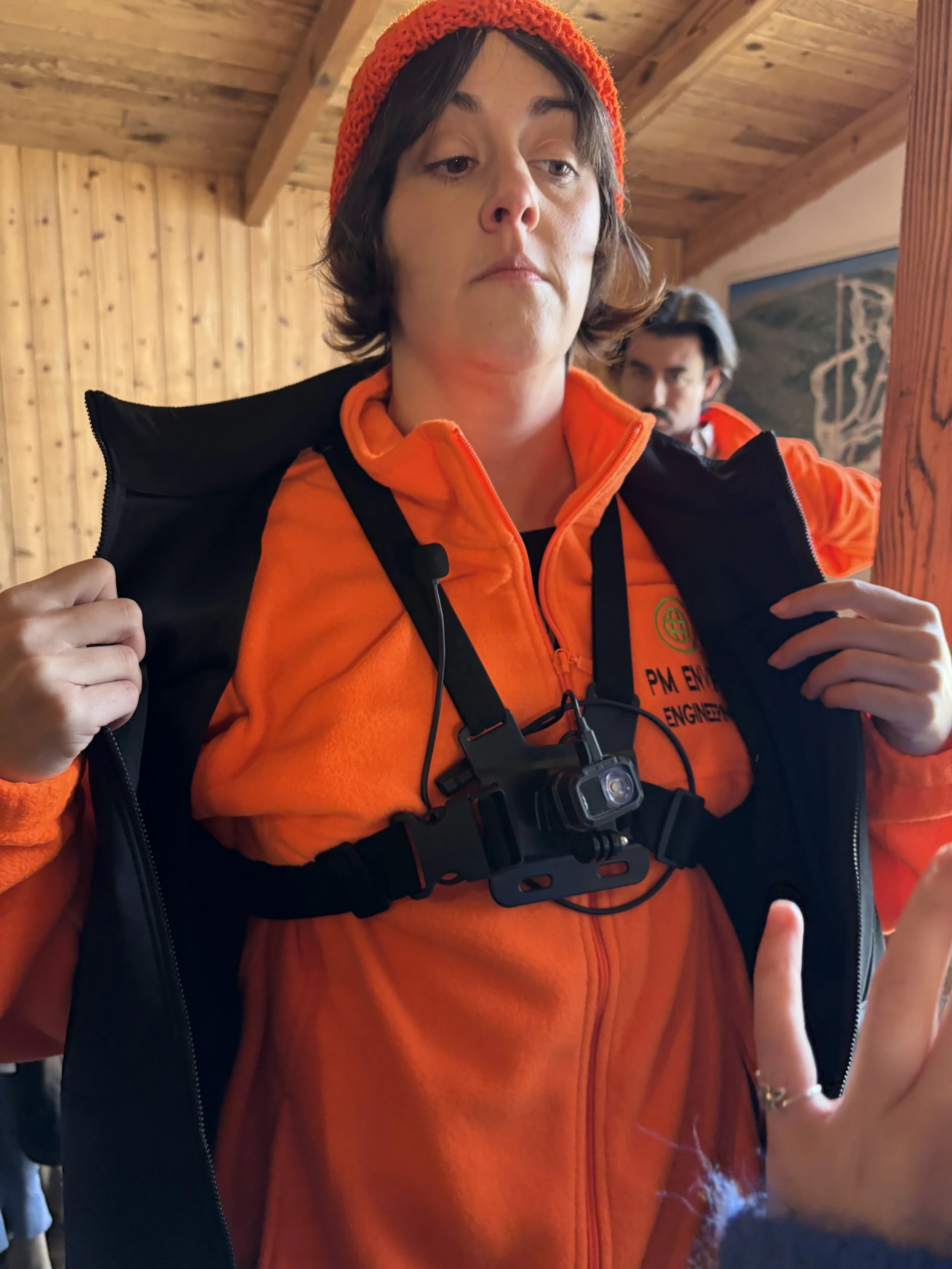 Body camera prop built from go-pro harness, microphone, and LED light.