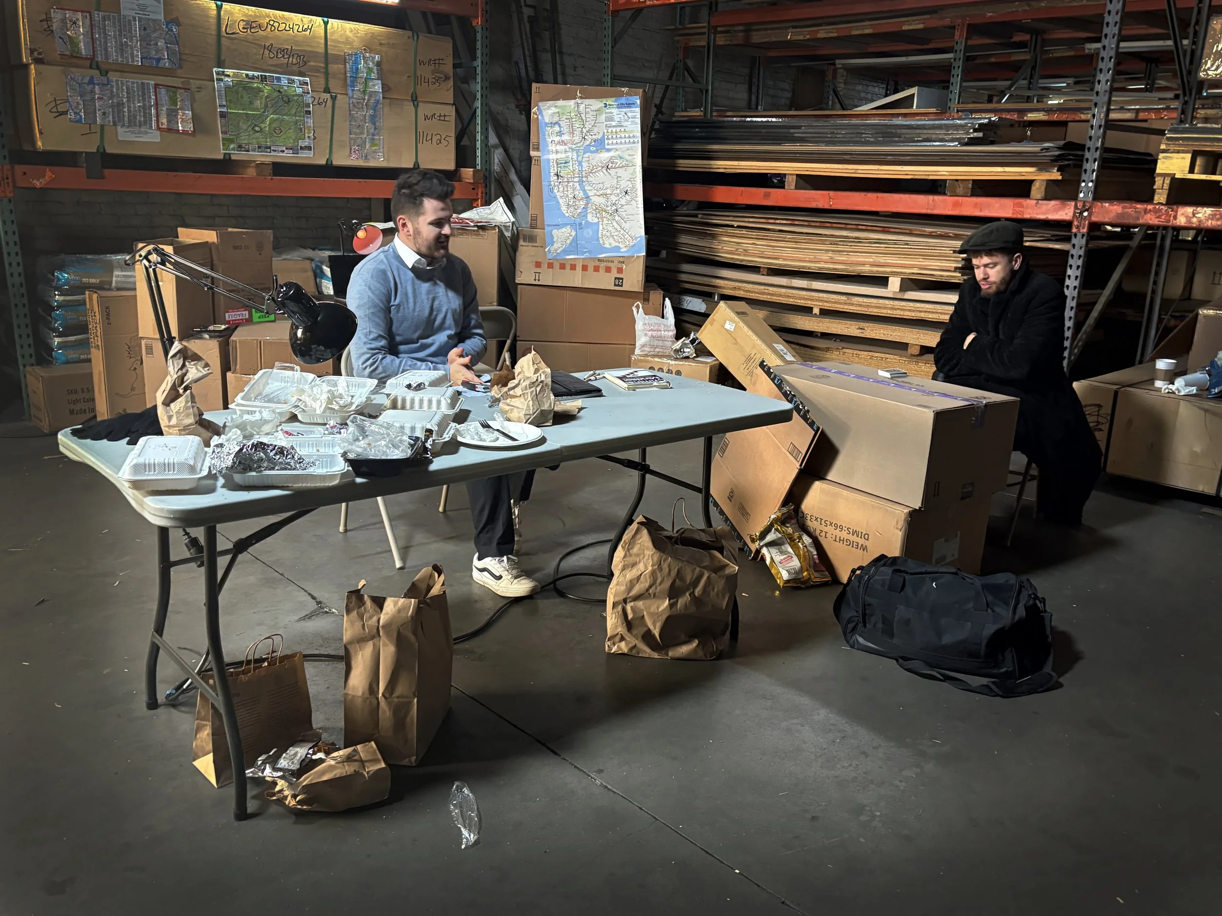 A single corner of a warehouse was transformed into a criminal hideaway, designed to suggest multiple days of concealment and improvised living. The environment was built to feel worn, functional, and psychologically informed, supporting character an