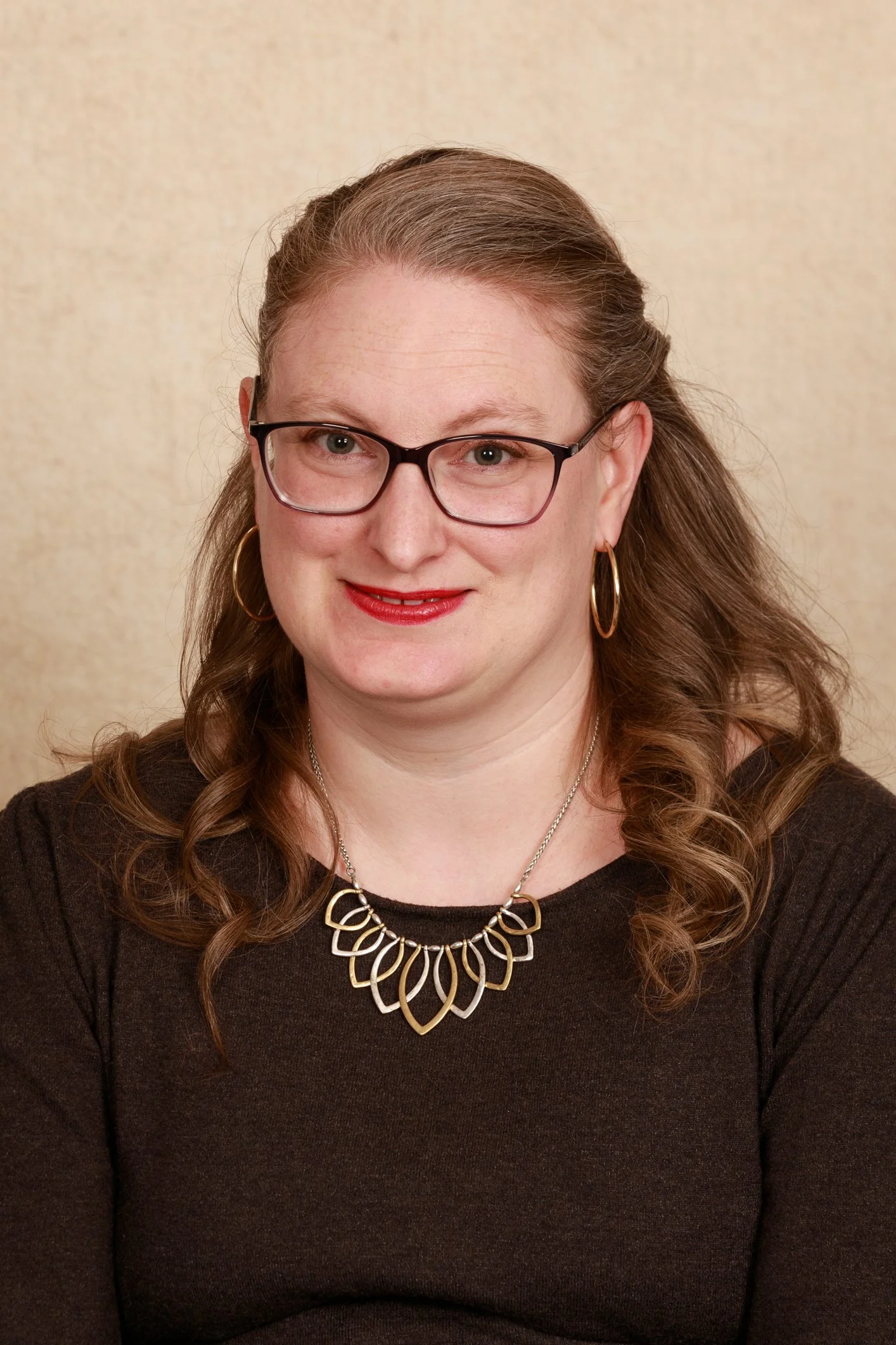 A headshot of Brittany