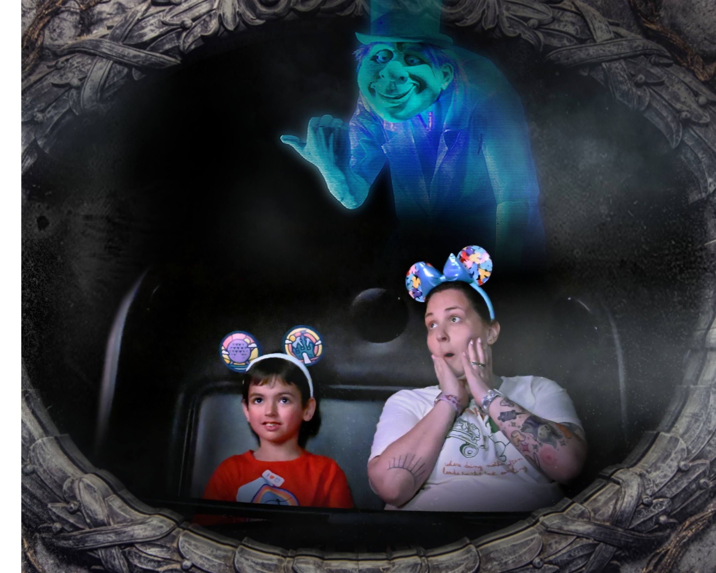 Two children and an adult inside a dark circular space, possibly a tunnel or slide opening. One young boy with short dark hair and a red shirt is looking upward. A girl with long dark hair and a headband with colorful patterns is covering her ears and looking to the side. A woman with tattoos on her arms is holding her face with both hands, looking surprised or excited. A floating figure of a cartoon character with a smiling face, blue skin, and a tall top hat is located at the top of the scene, appearing to be part of a digital or augmented reality display.