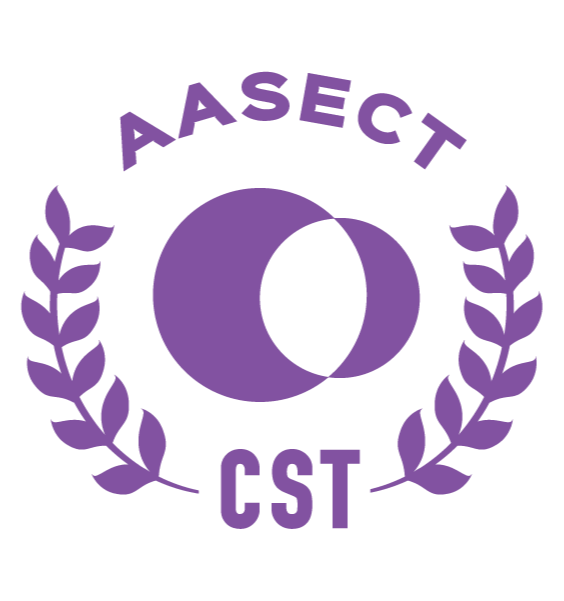 A purple circular logo with the words "AASECT CST" arched around the top and bottom, featuring a large letter "O" in the center, surrounded by two laurel branches.