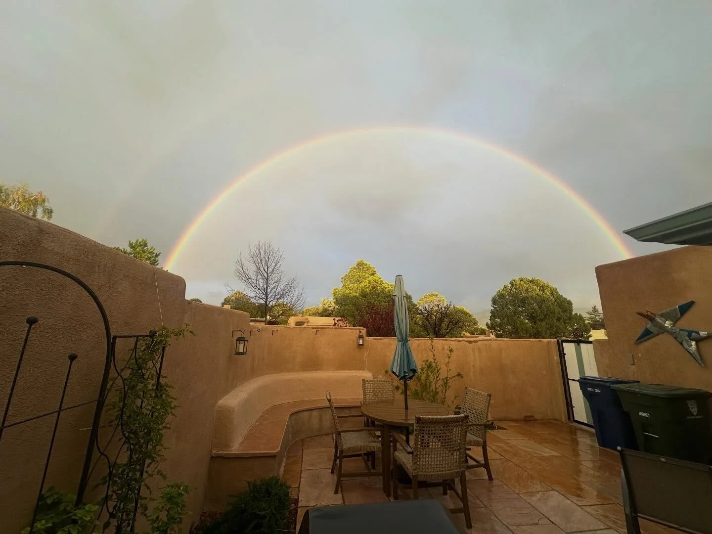 It&rsquo;s been a rough day&hellip;then I stood in the rain on my patio to get these pics🌈 A gift😇💕