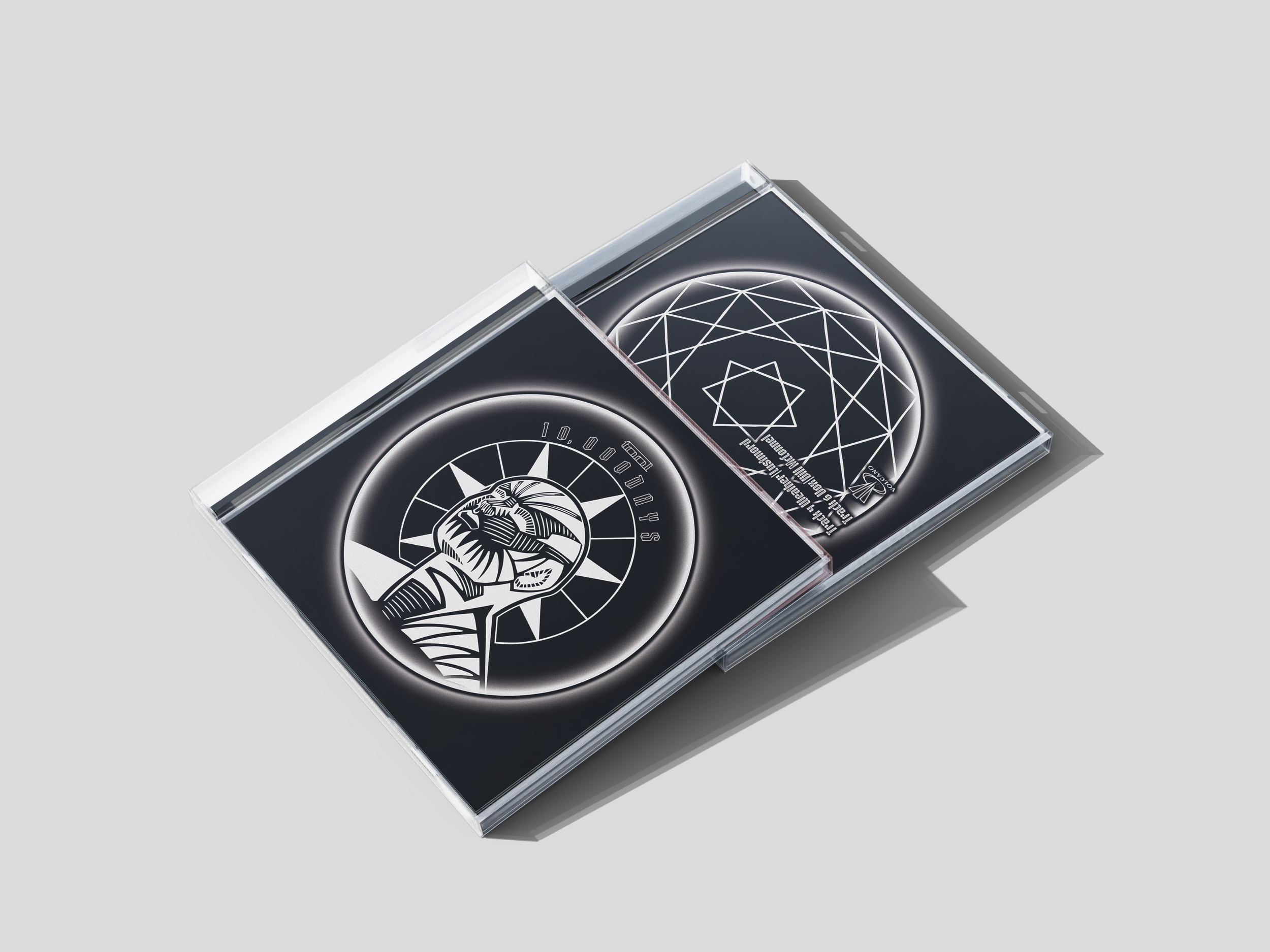 An image of two CD Jewel cases stacked at an angle, depicting the front and back of the album.