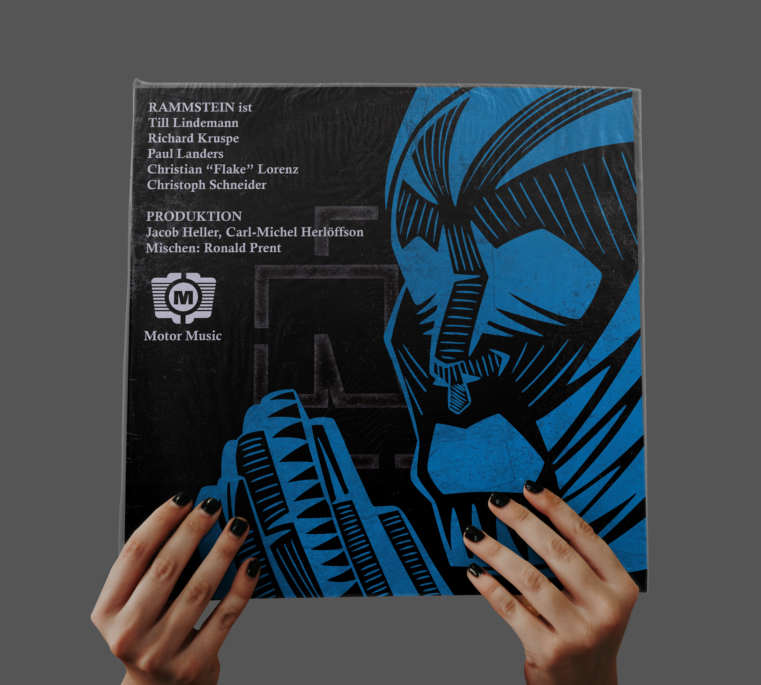 A picture of hands holding up the album's outside back.