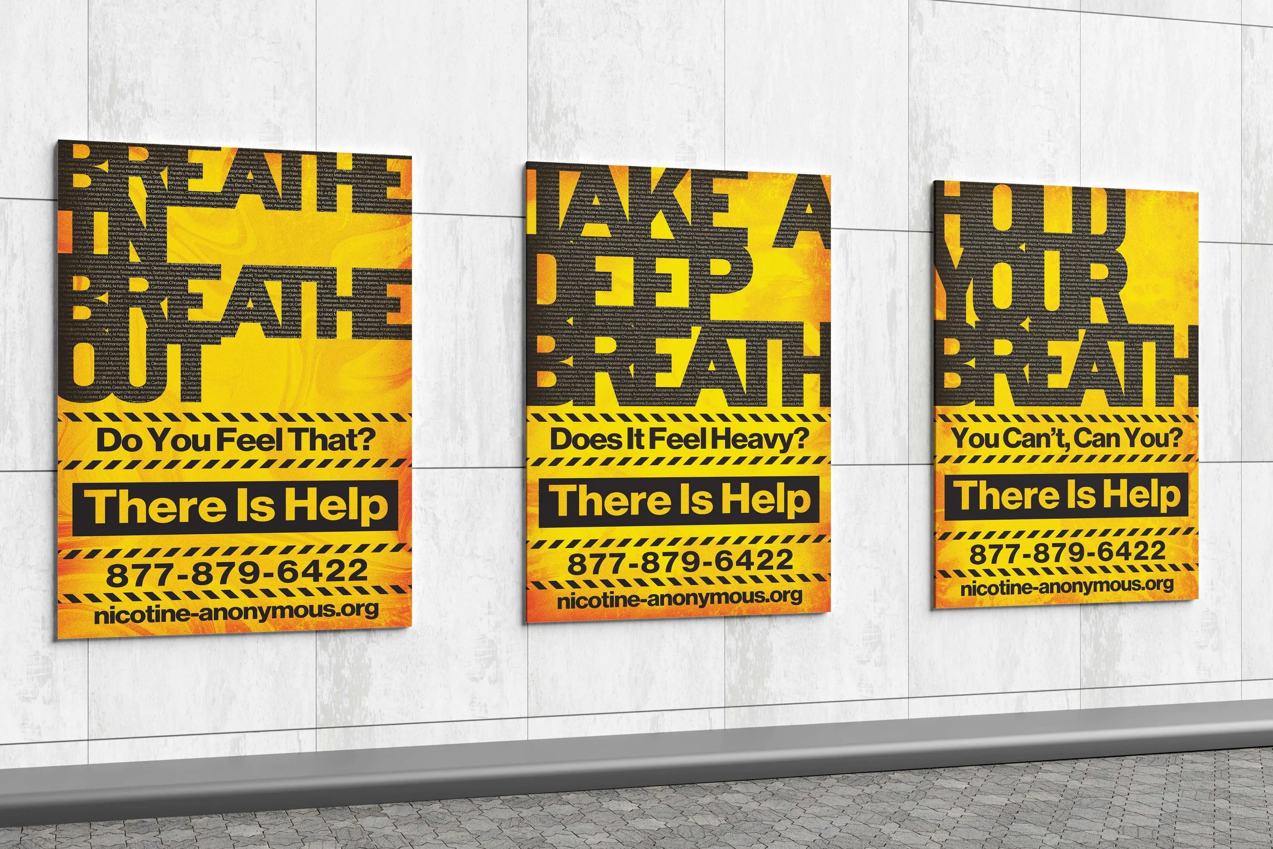 A picture of three posters on a marble wall.