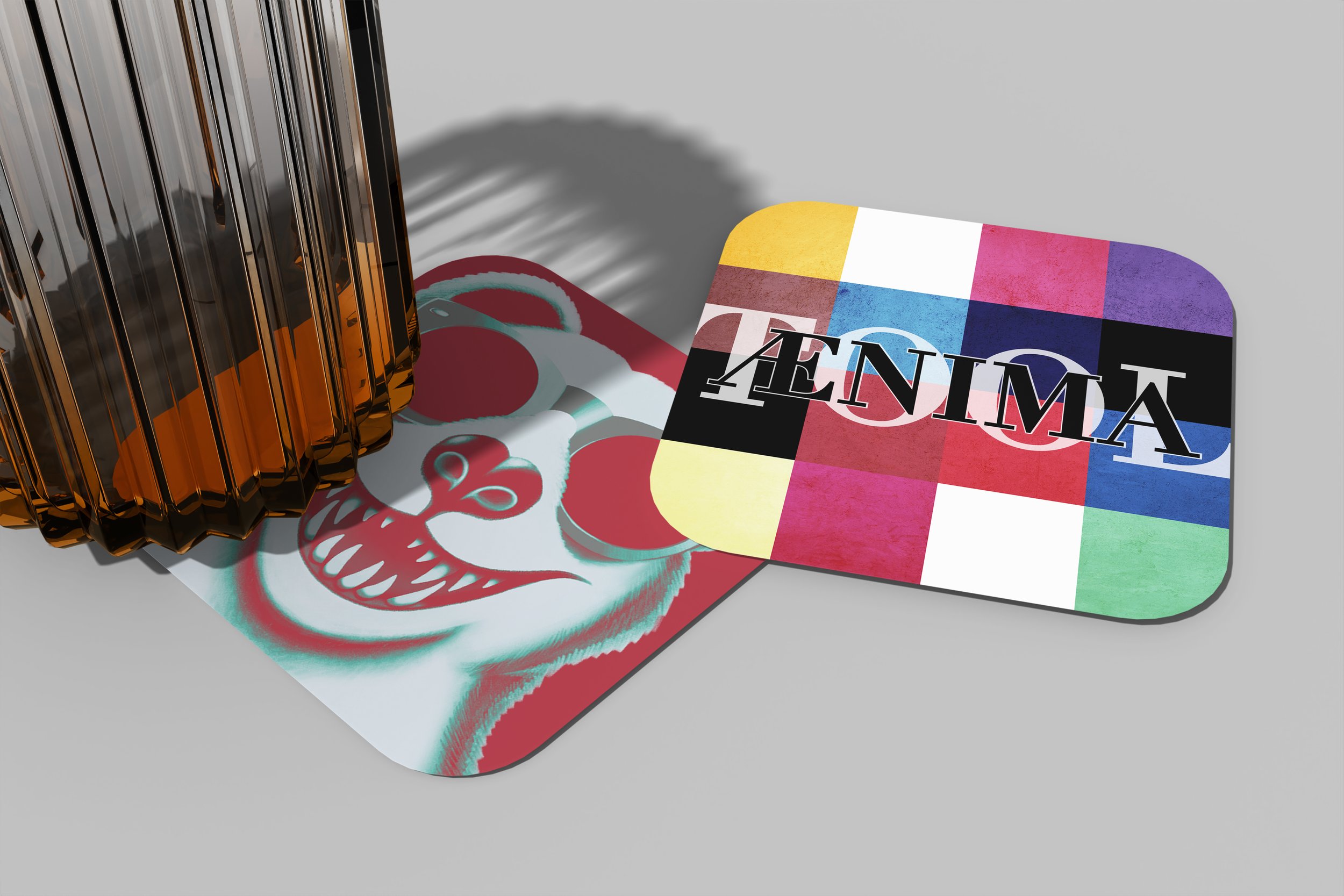 A mockup of two drink coasters, one with a drink on it, and the other upside down.