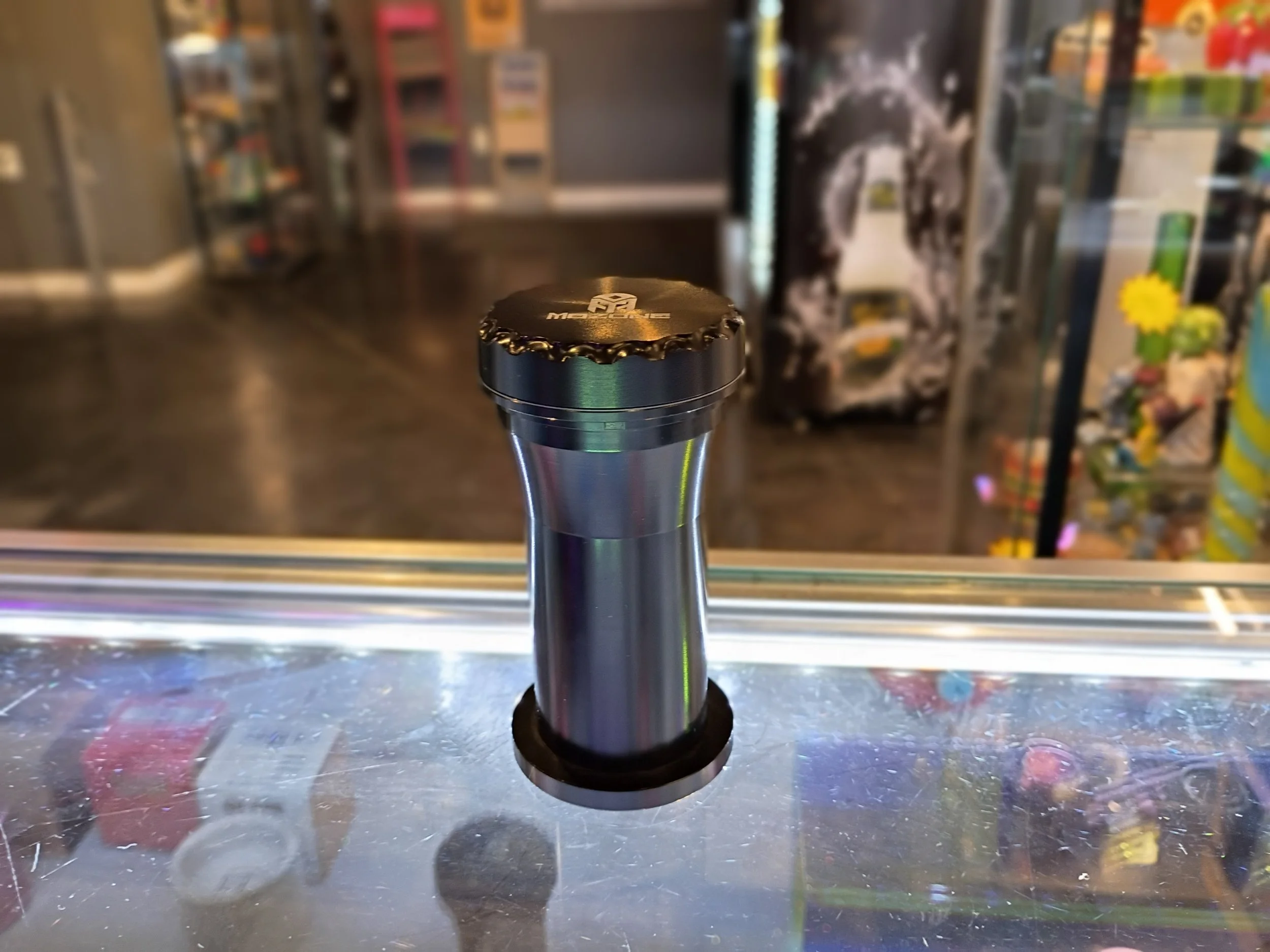 Tall mozone grinder