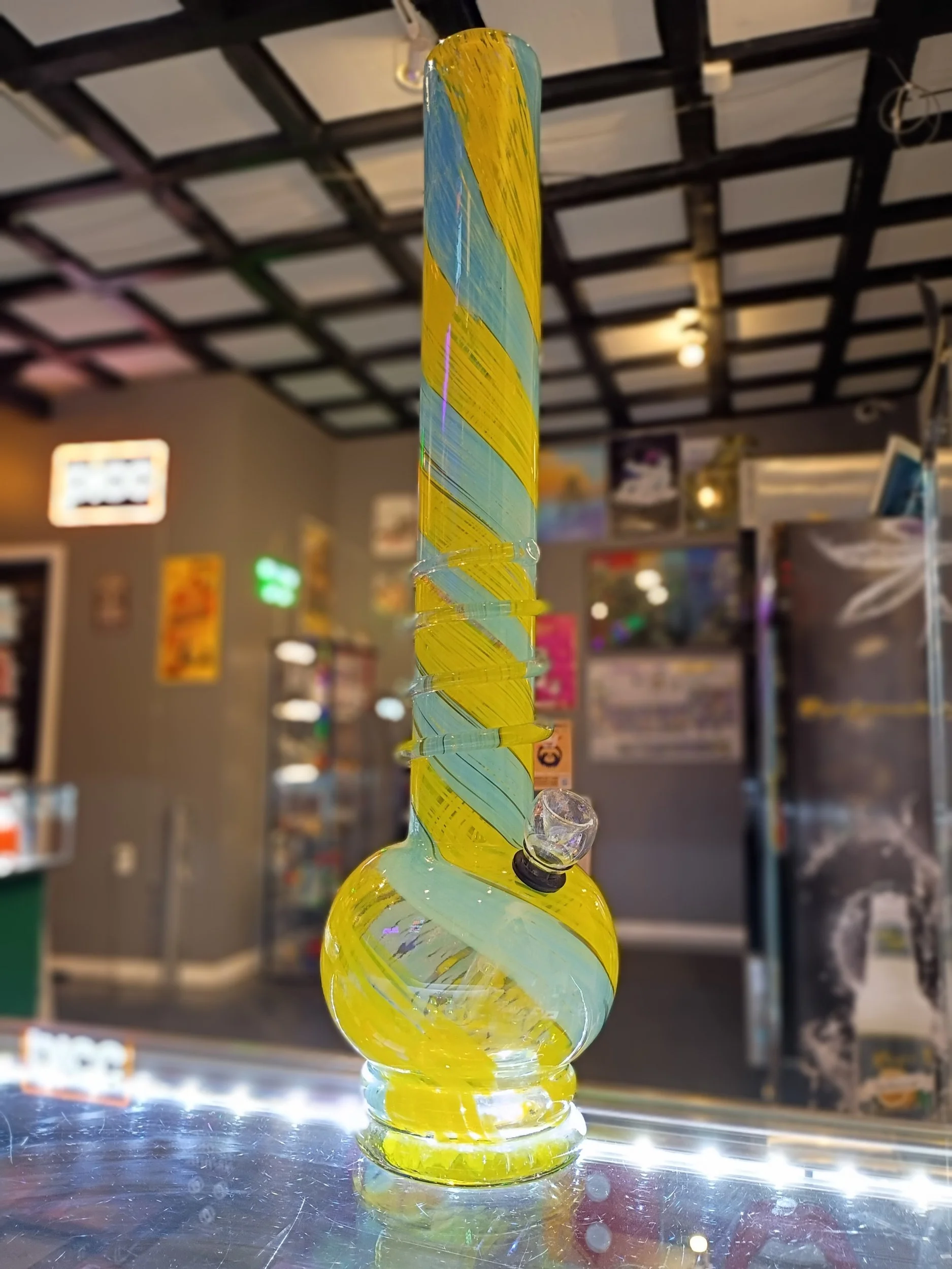 Tall glass blue and yellow bong
