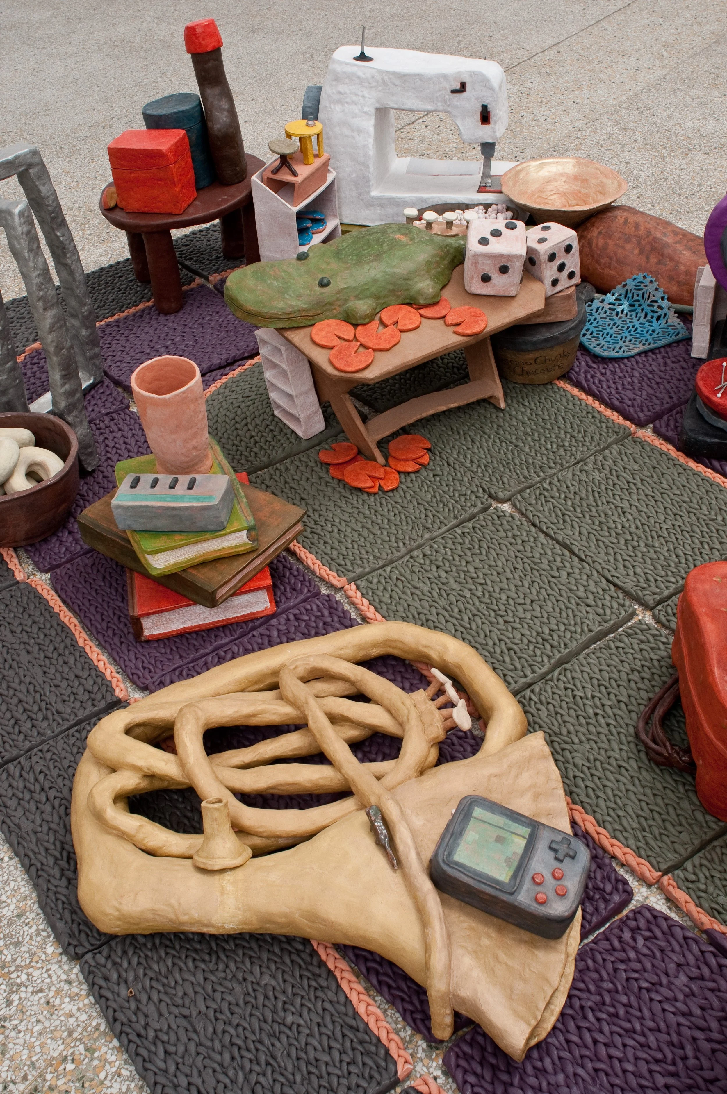 Tuba and Game Boy Section and Rug Close Up

All Low Fire Clay