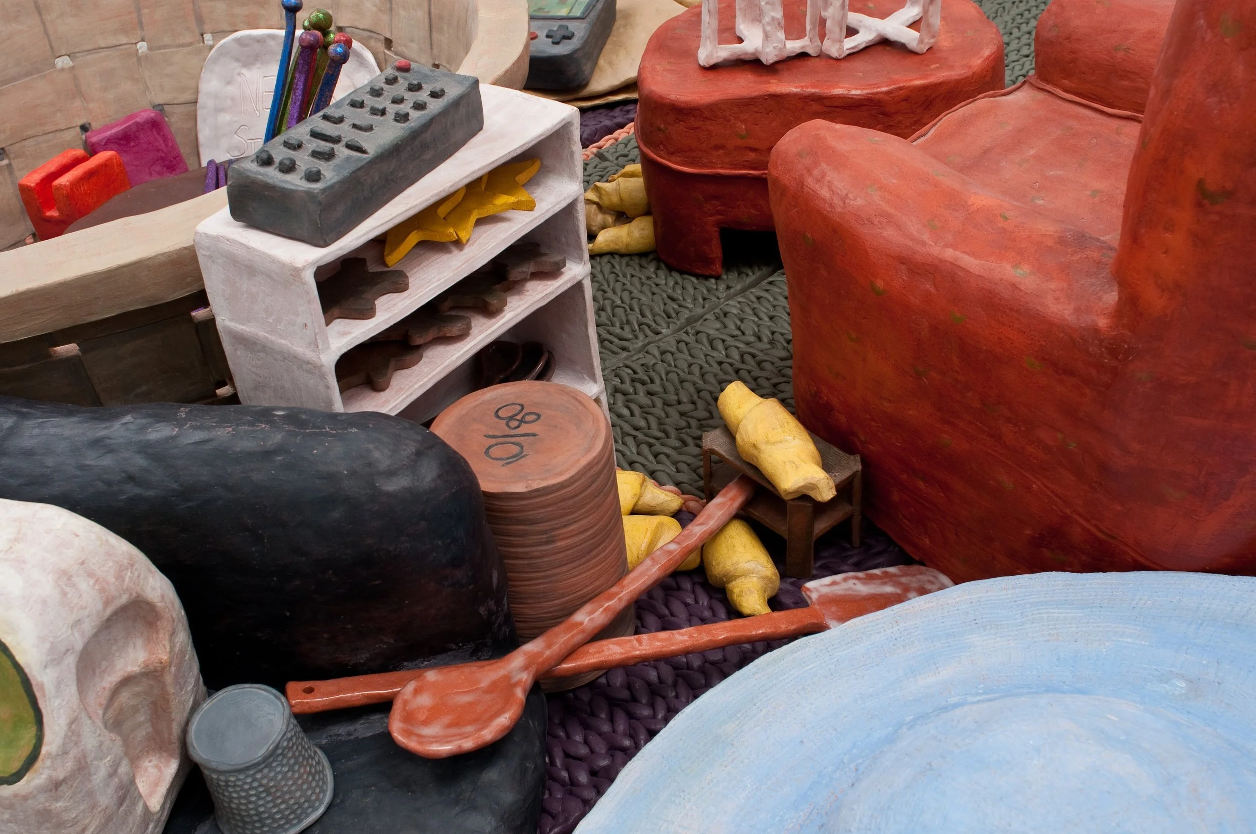 Remote Control, Book Shelf, Rumble Seat, Giant Thimble, Party Hat, Crescent Rolls, Spoons Close Up

All Low Fire Clay