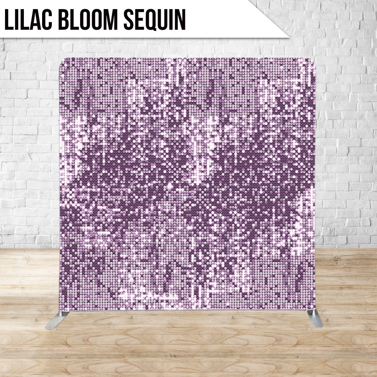 A decorative screen with lilac-colored sequins arranged in a pixelated floral pattern, set against a white brick wall with a wooden floor.