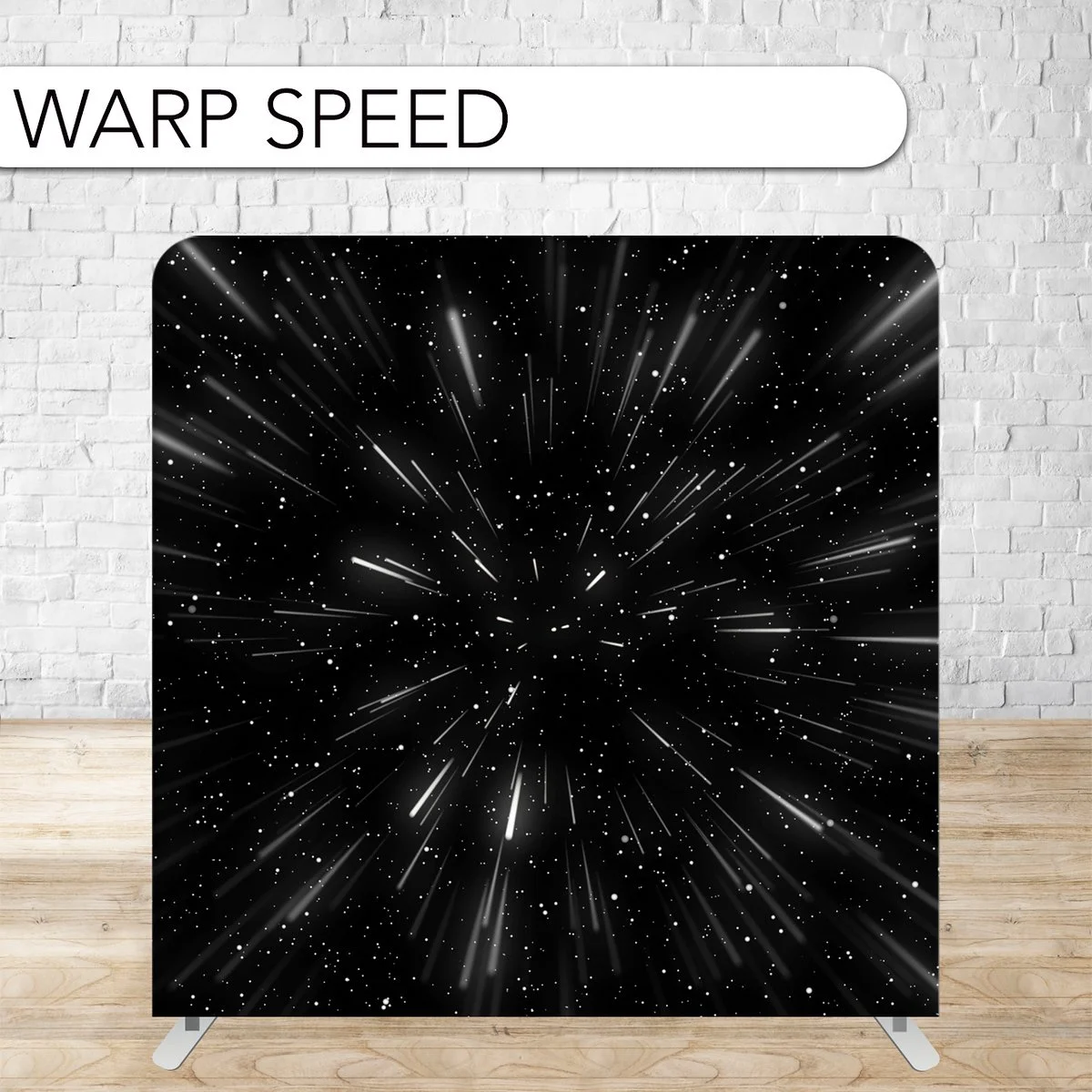 A black cosmic explosion design with white streaks and dots resembling a starburst or galaxy.