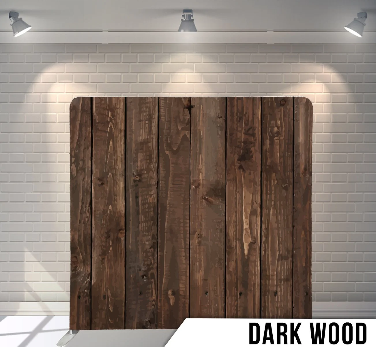 A dark wood partition with vertical planks in a room with white brick walls and overhead lighting.