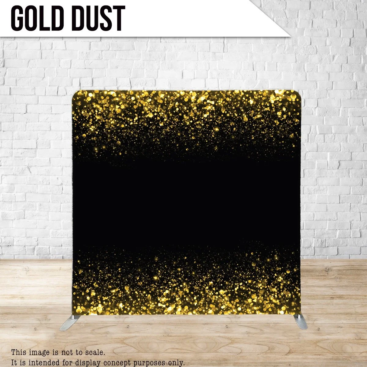 A display stand with a black background and gold glitter pattern at the top and bottom, placed against a white brick wall in a room with wood flooring. A sign labeled 'GOLD DUST' is positioned at the top left corner.