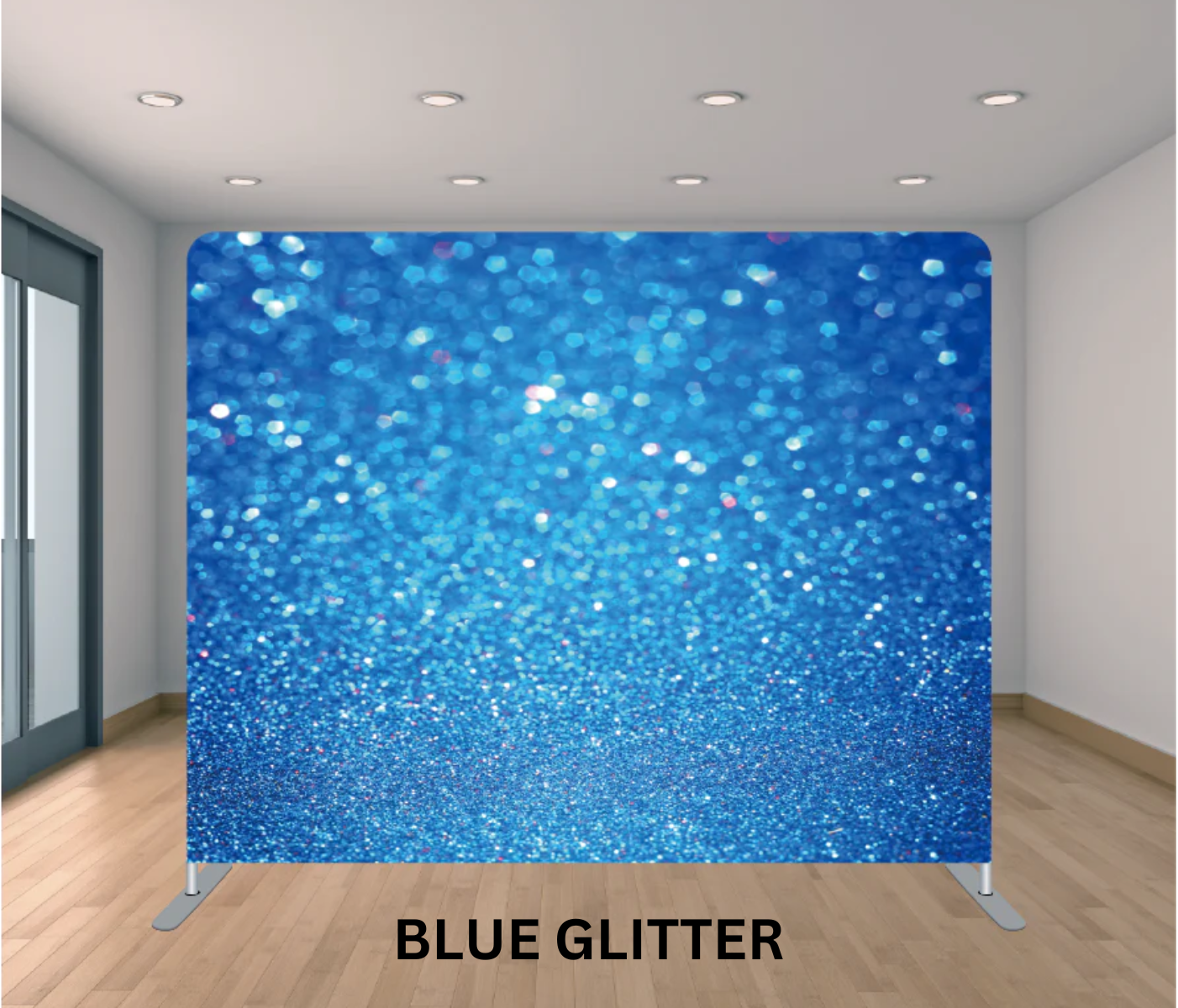 Blue glitter backdrop in a room with white walls, wood flooring, ceiling lights, and a glass door on the left side.