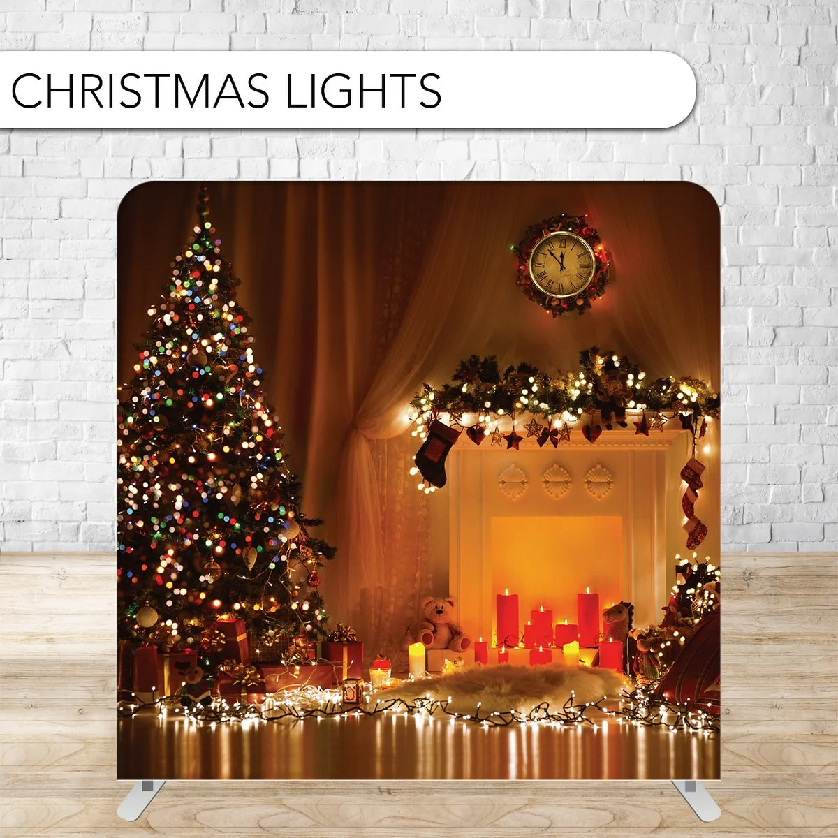 Decorated Christmas tree with multicolored lights and presents underneath, and a festive fireplace mantle with candles, teddy bears, and stockings in warm lighting