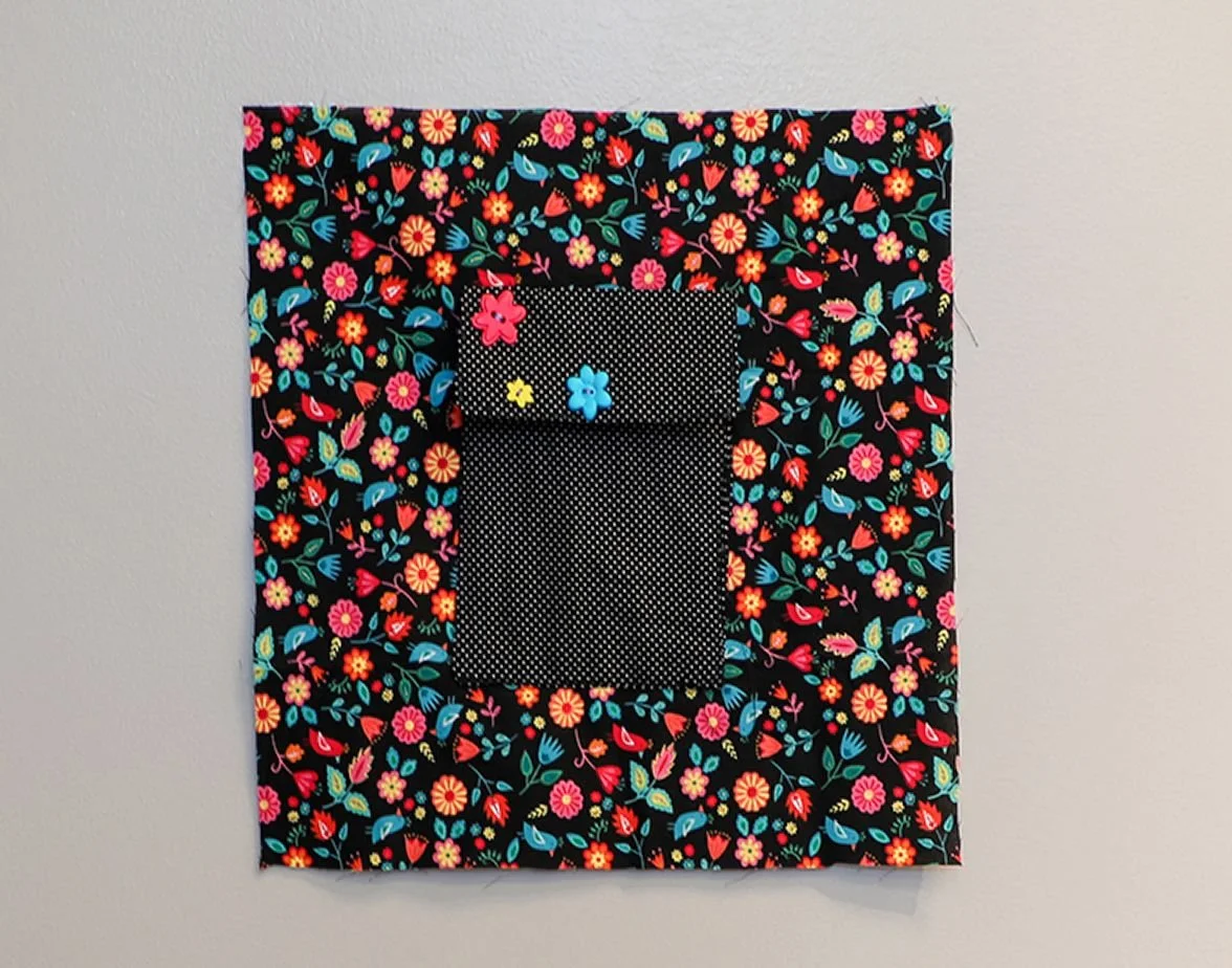 WORDS OF PEACE
I wanted my square to be interactive. The pocket holds affirmation scrolls. It occurred to me that having viewers “participate” would deepen their experience of our quilt and remind them of the significance of peace and kindness in the