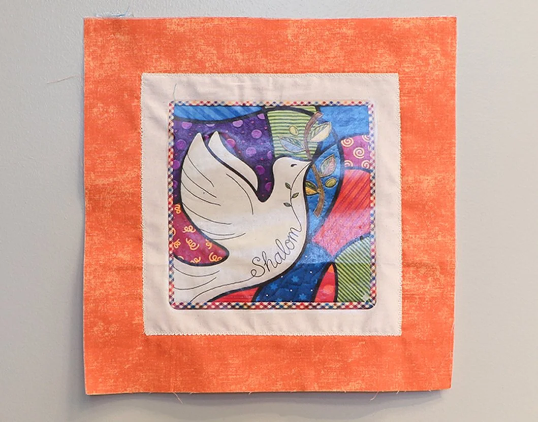 A LEGACY OF PEACE
This quilt square is created in memory of family members.