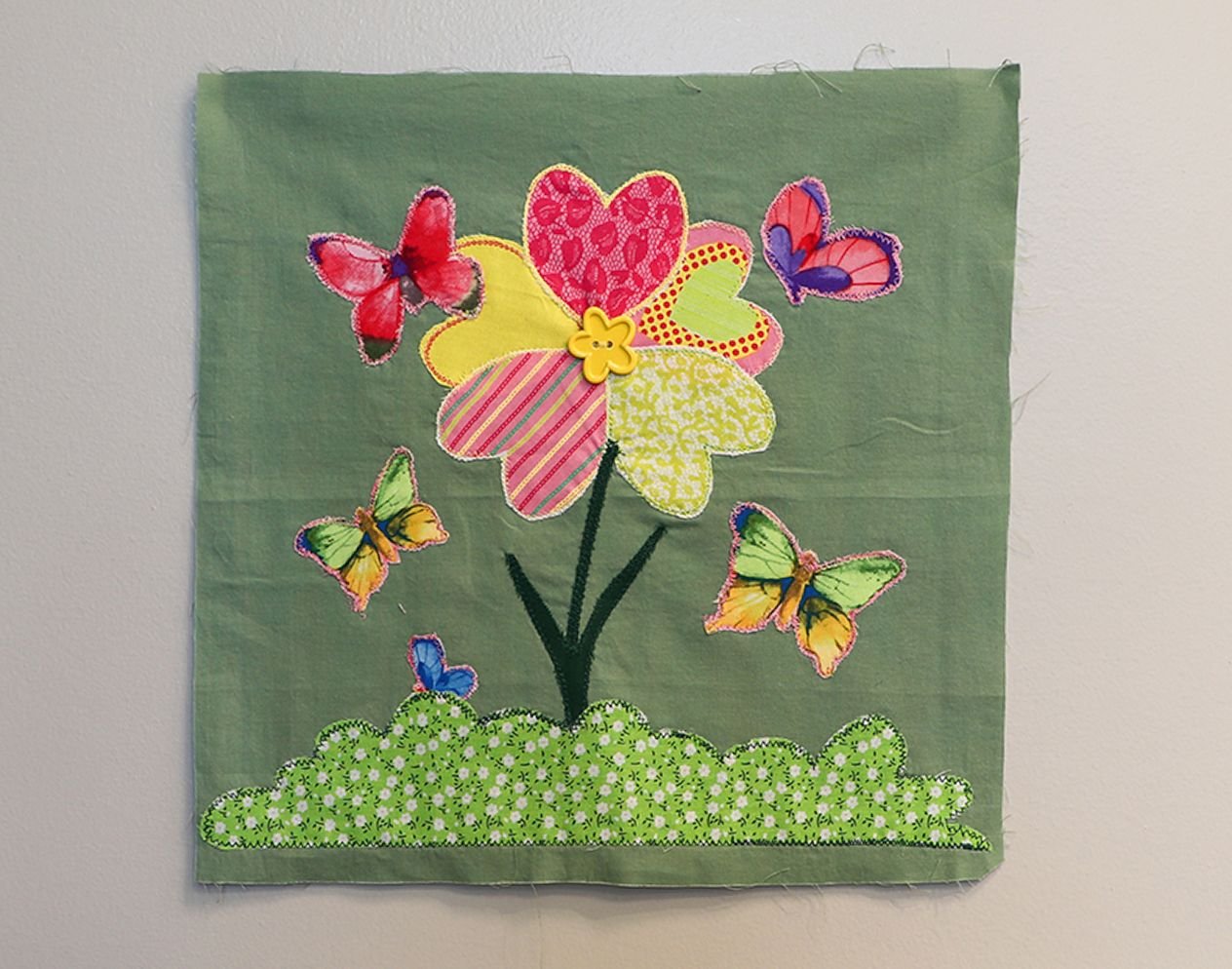 NATURE AND FLORAL
My love of nature inspired me to create this square featuring fluttering butterflies and blooming flowers.