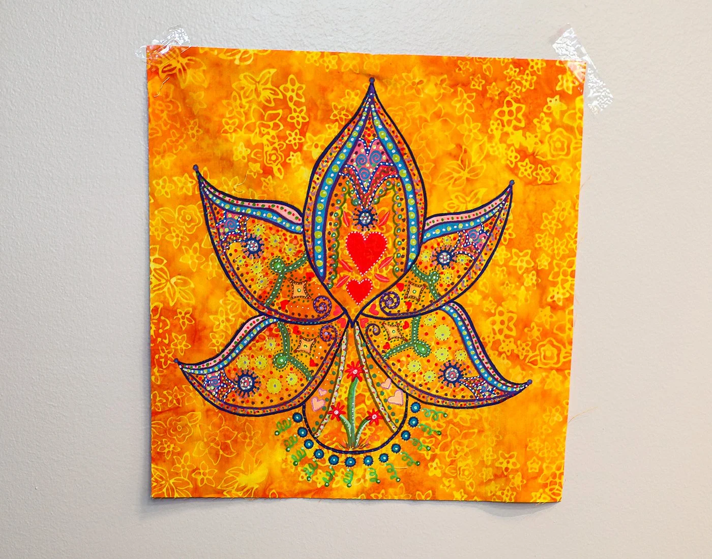 PEACE BLOOMS IN COLOR
A vibrant lotus flower of many colors reflects our diversity and carries the ancient symbol of purity, rebirth, and spiritual awakening. Rooted in the mud, it still finds the strength to rise above the water and bloom in simple 