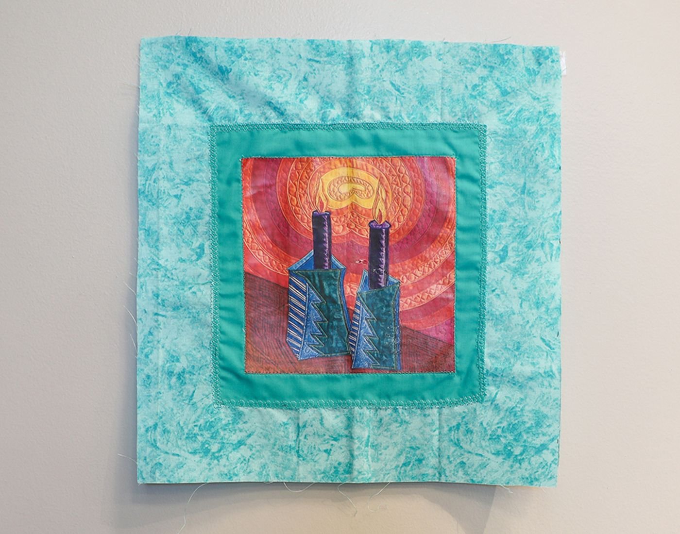 UNBROKEN LIGHT OF LOVE
There was a profound sanctity in watching my mother light the Sabbath candles. As the flames caught, she seemed to transcend into another world entirely, a holy space where she was at One with Everything. It is the memory of he