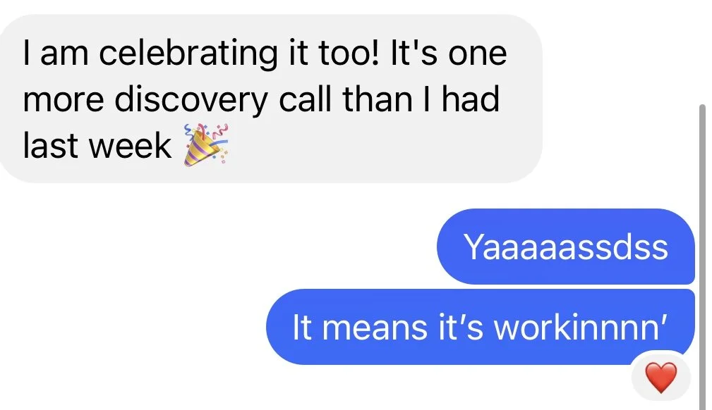 Text message conversation with celebratory message and heart emoji.