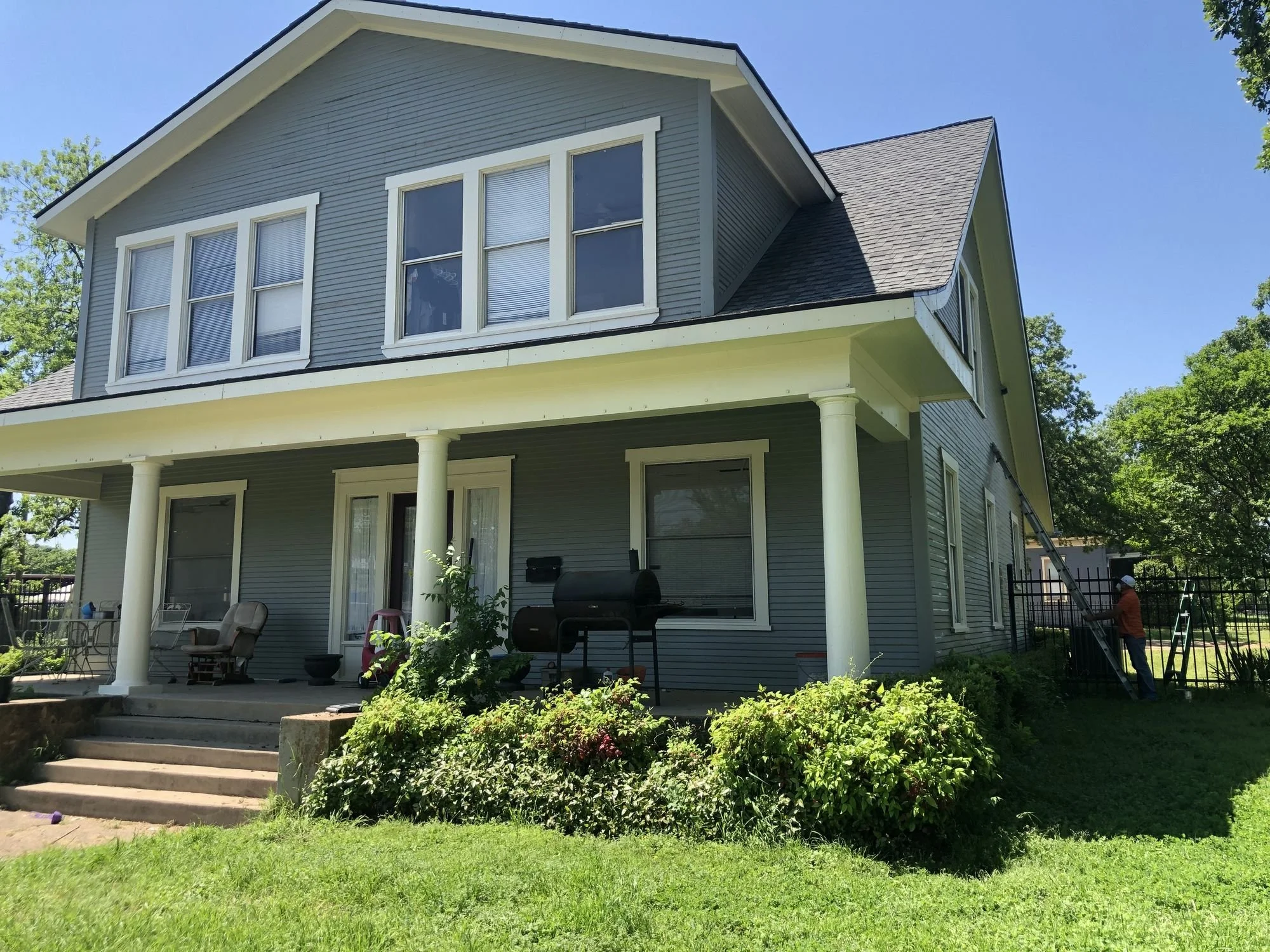 Home with new siding in Arlington, TX by Christian Brothers Roofing