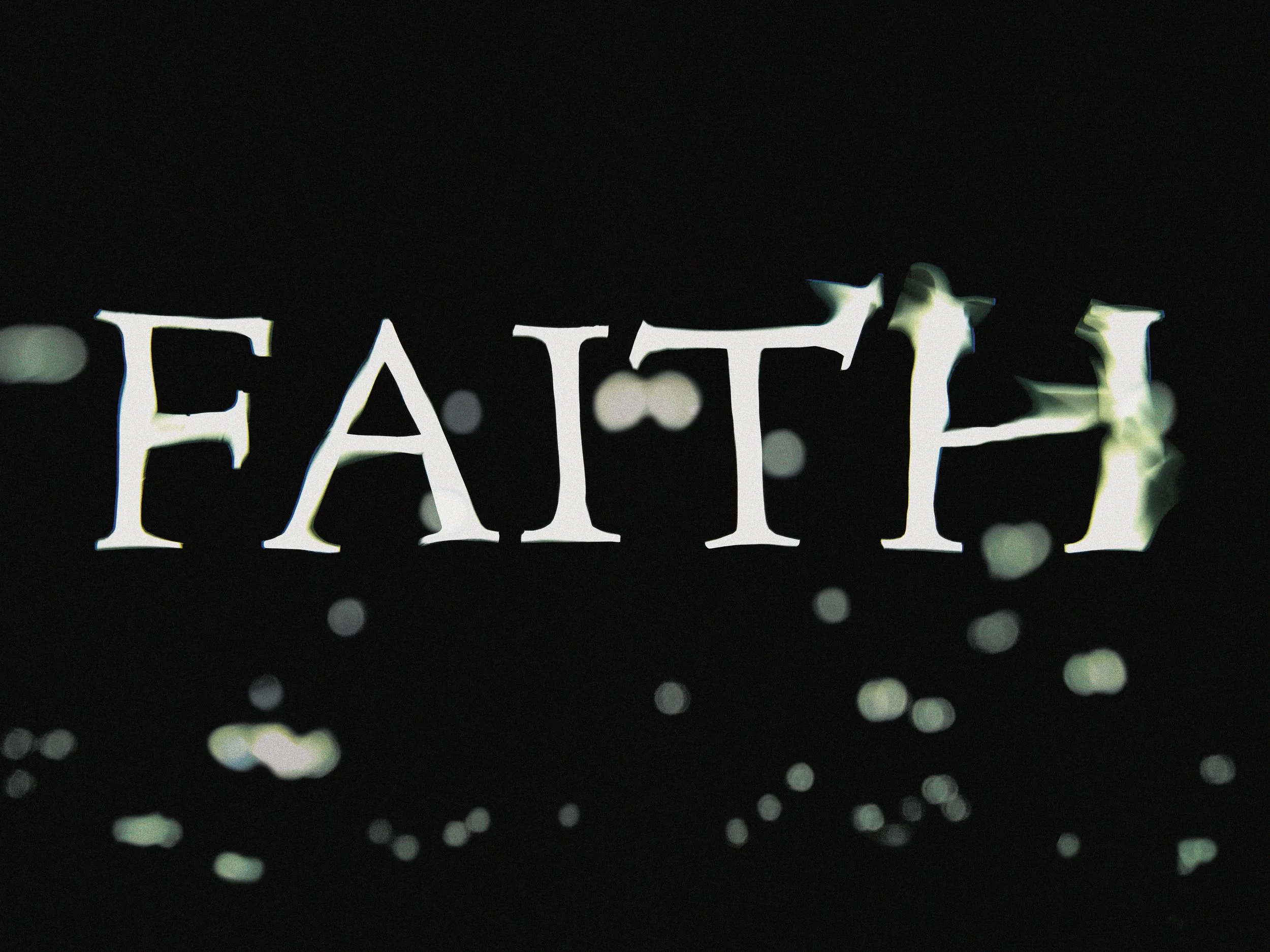 Photo experiment with text, water, and light.