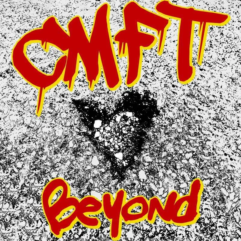 Surface of ground with black spray-painted heart and the words 'Come True' and 'Beyond' in red and yellow graffiti style text.