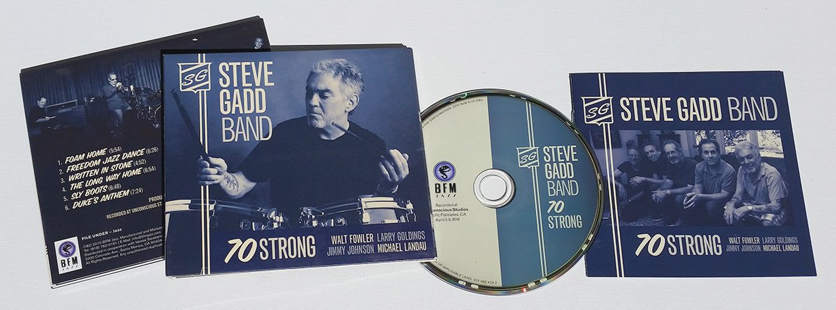 CD album and promotional materials for Steve Gadd Band's "70 Strong," featuring a photo of Steve Gadd playing drums, a tracklist, and band members sitting together