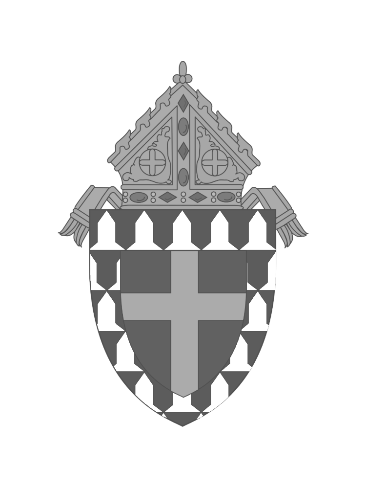 A grayscale illustration of a royal crest or shield, featuring a crown on top, a shield with a cross in the center, and various ornamental details.
