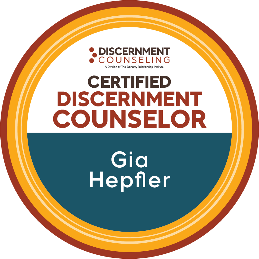 Badge or sticker indicating certification as a 'Discernment Counselor' by Discerning Counseling, with the name 'Gia Hepfer' on it.