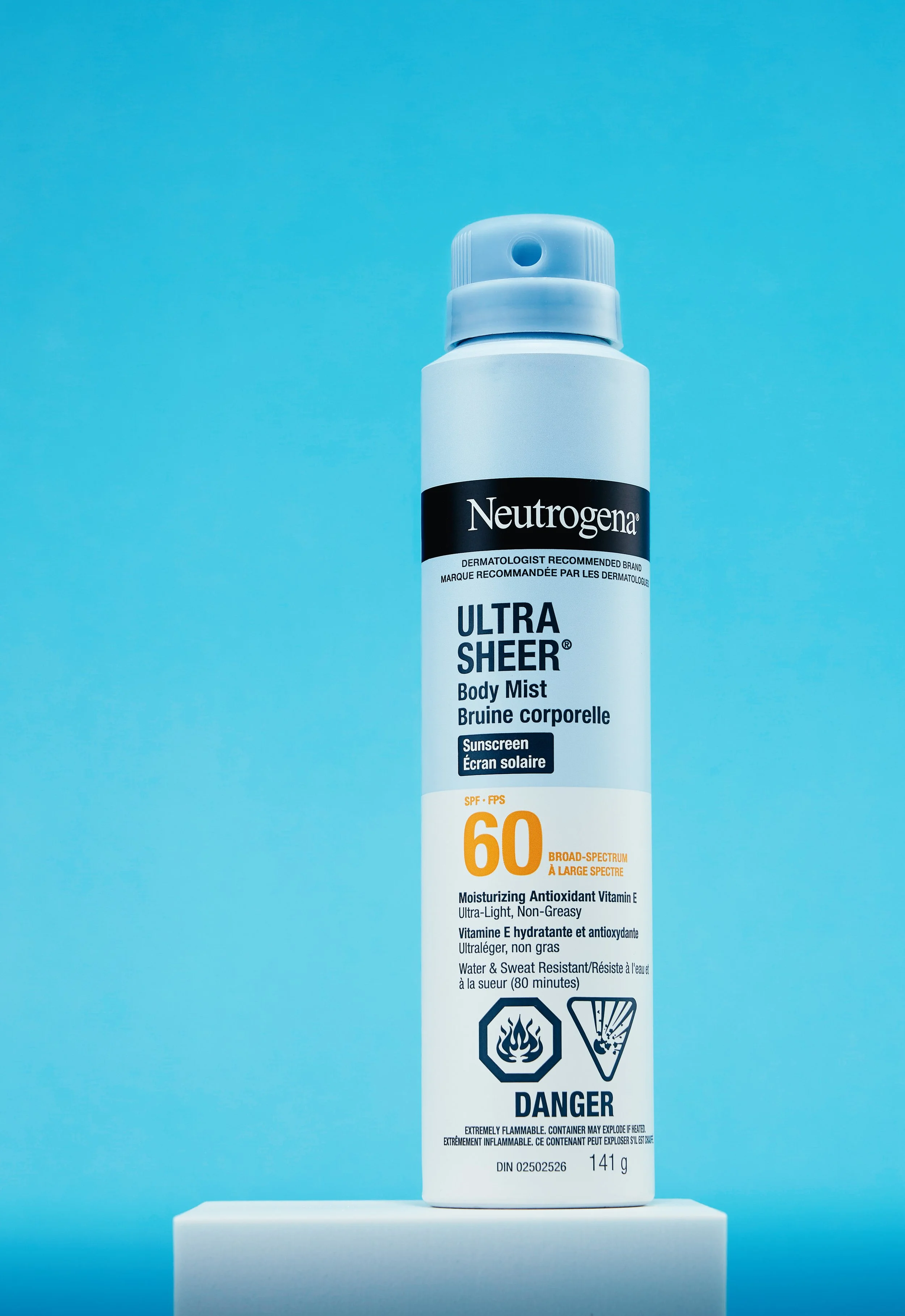 Neutrogena SPF 60 body myst on blue background product photography