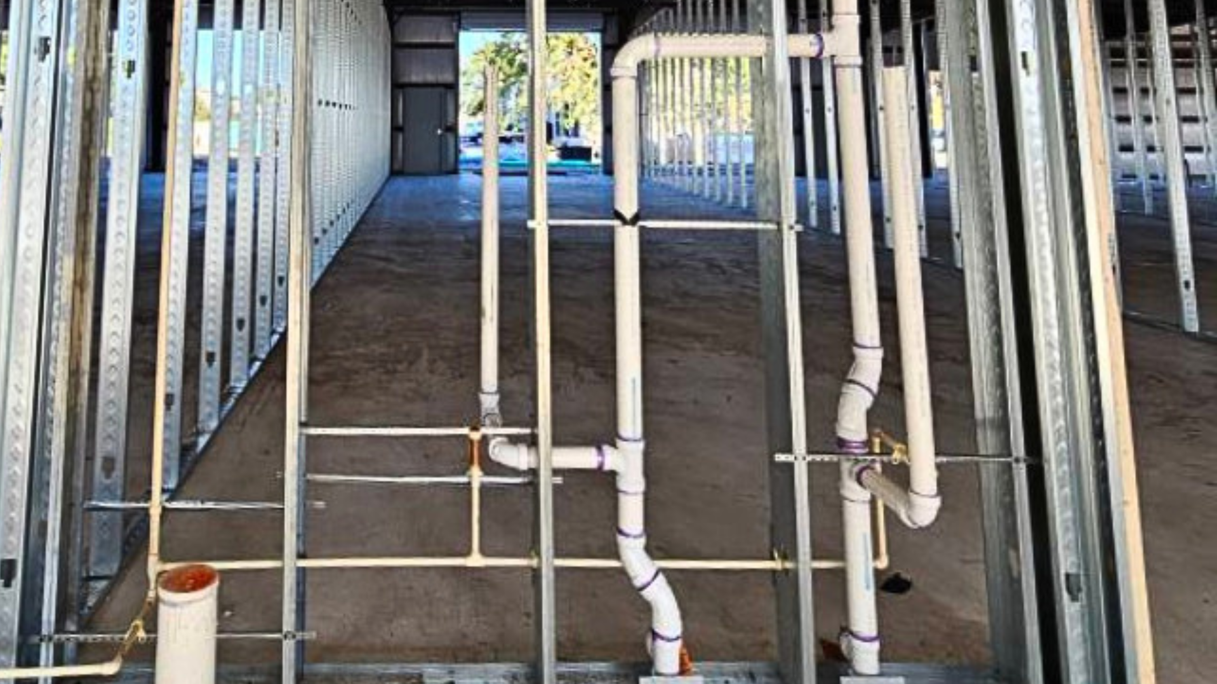 Commercial plumbing rough-in piping installation by Keene Plumbing Services on a Florida construction project