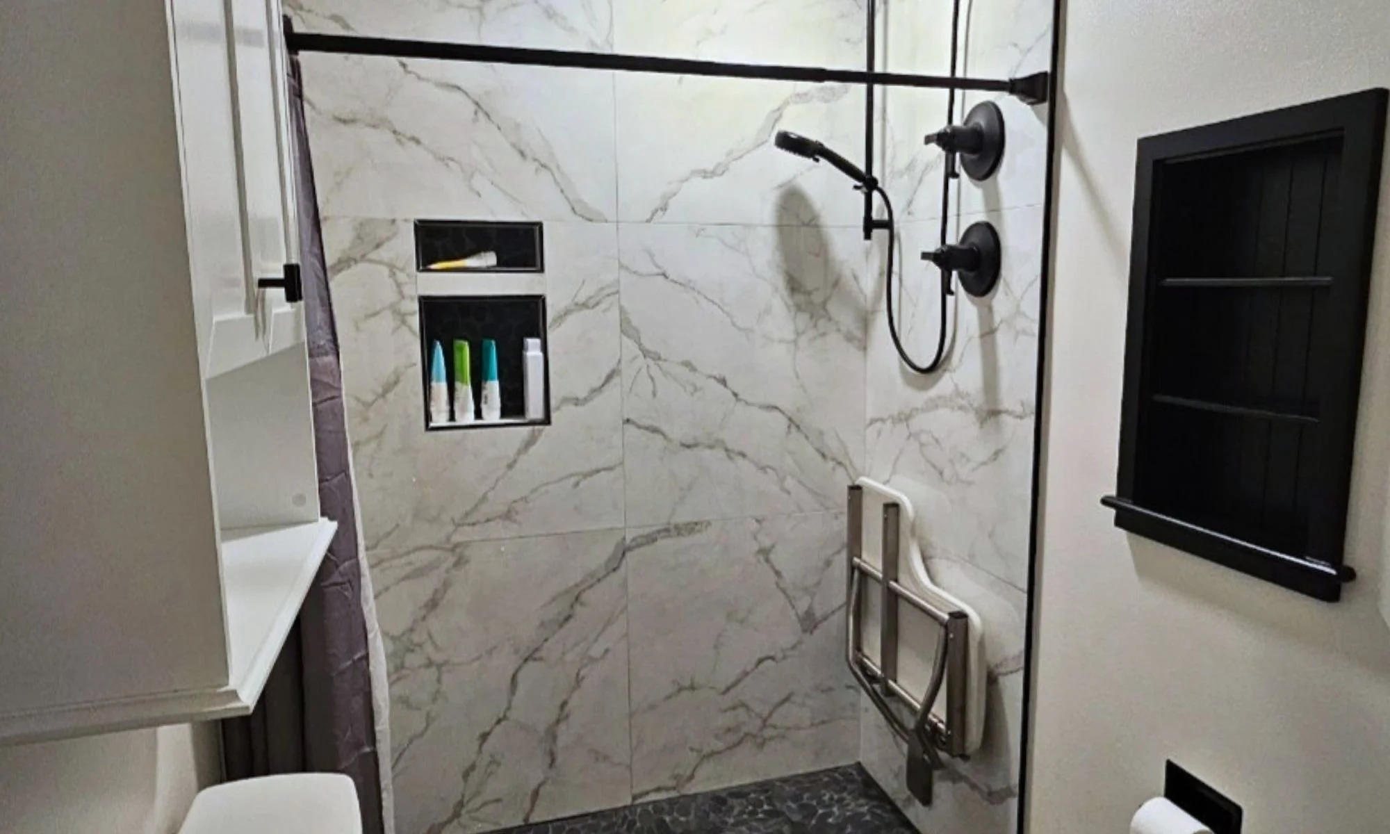 Bathroom remodel plumbing with custom shower installation by Keene Plumbing Services in Florida