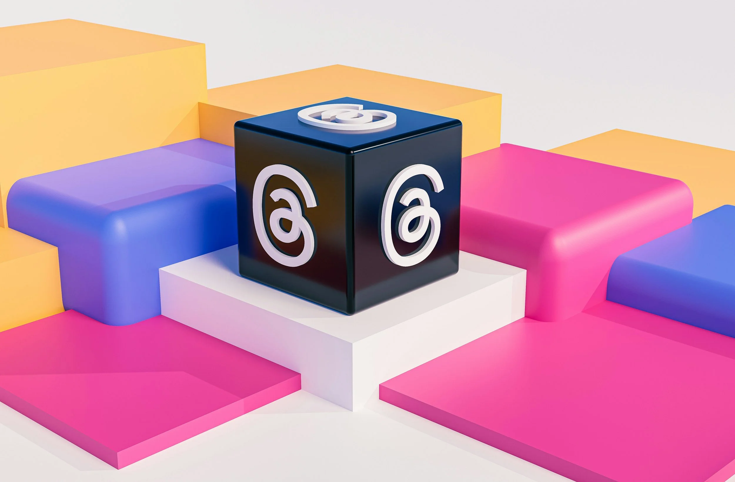 Threads logo on a black cube