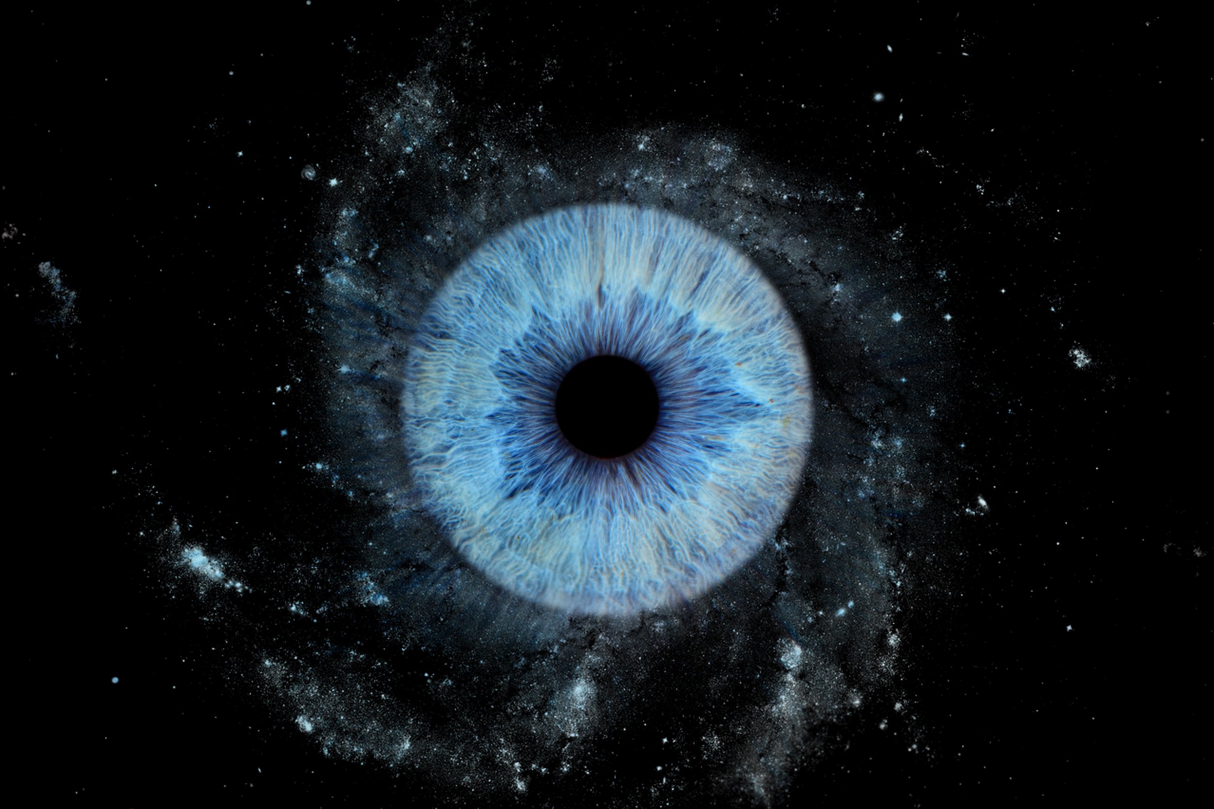 A close-up of a human eye with a blue iris, superimposed over a starry galaxy background.