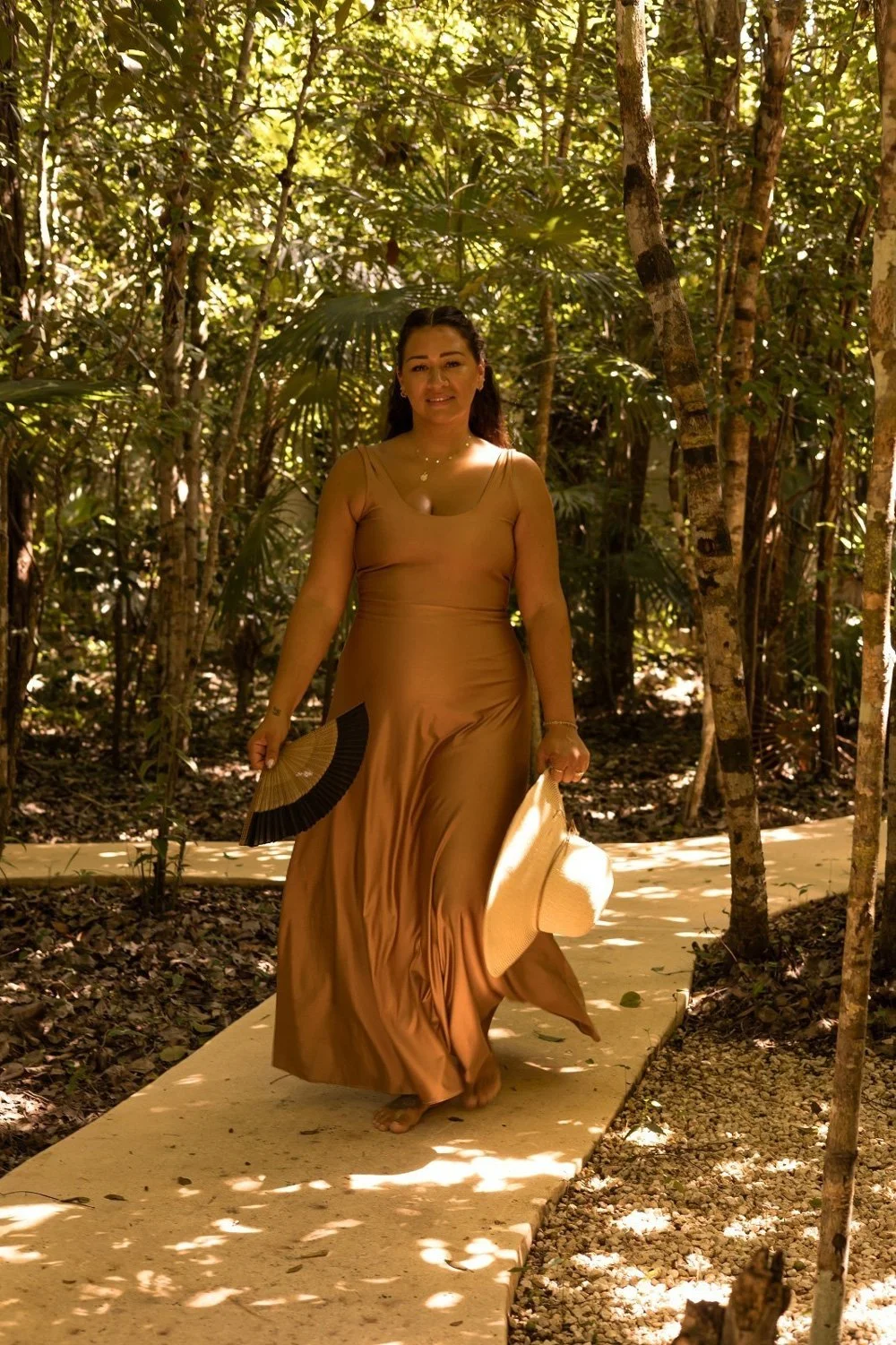 Cecilia Kissel walking through nature representing reflection and reconnecting with herself