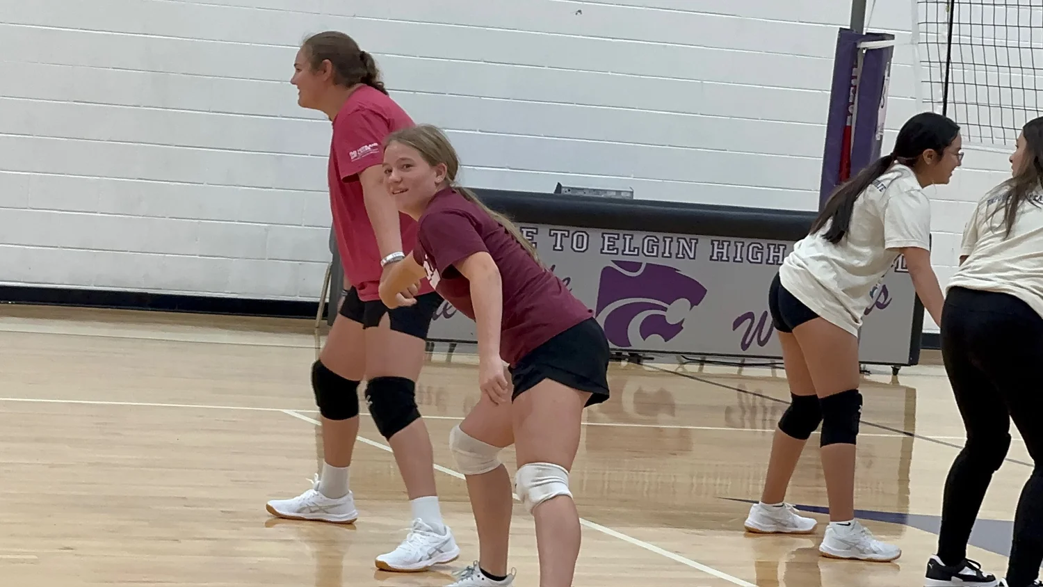 An athlete smiling during a camp training session.