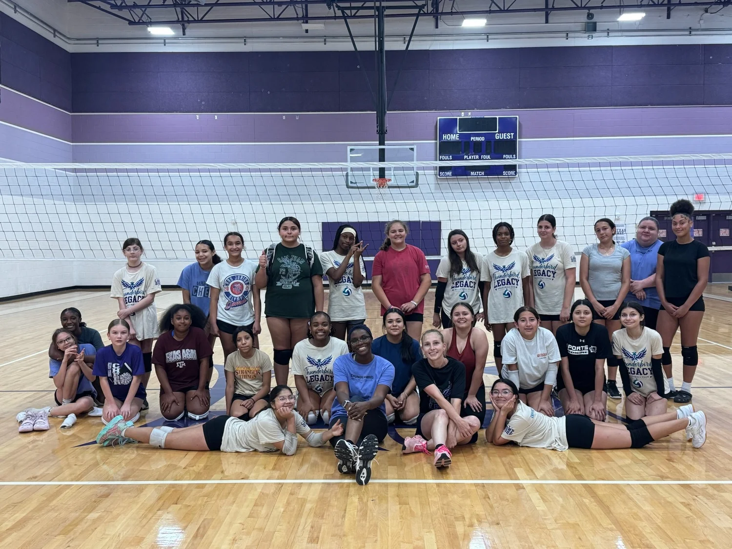 Camp athletes and coaches gathered for a group photo in the gym.