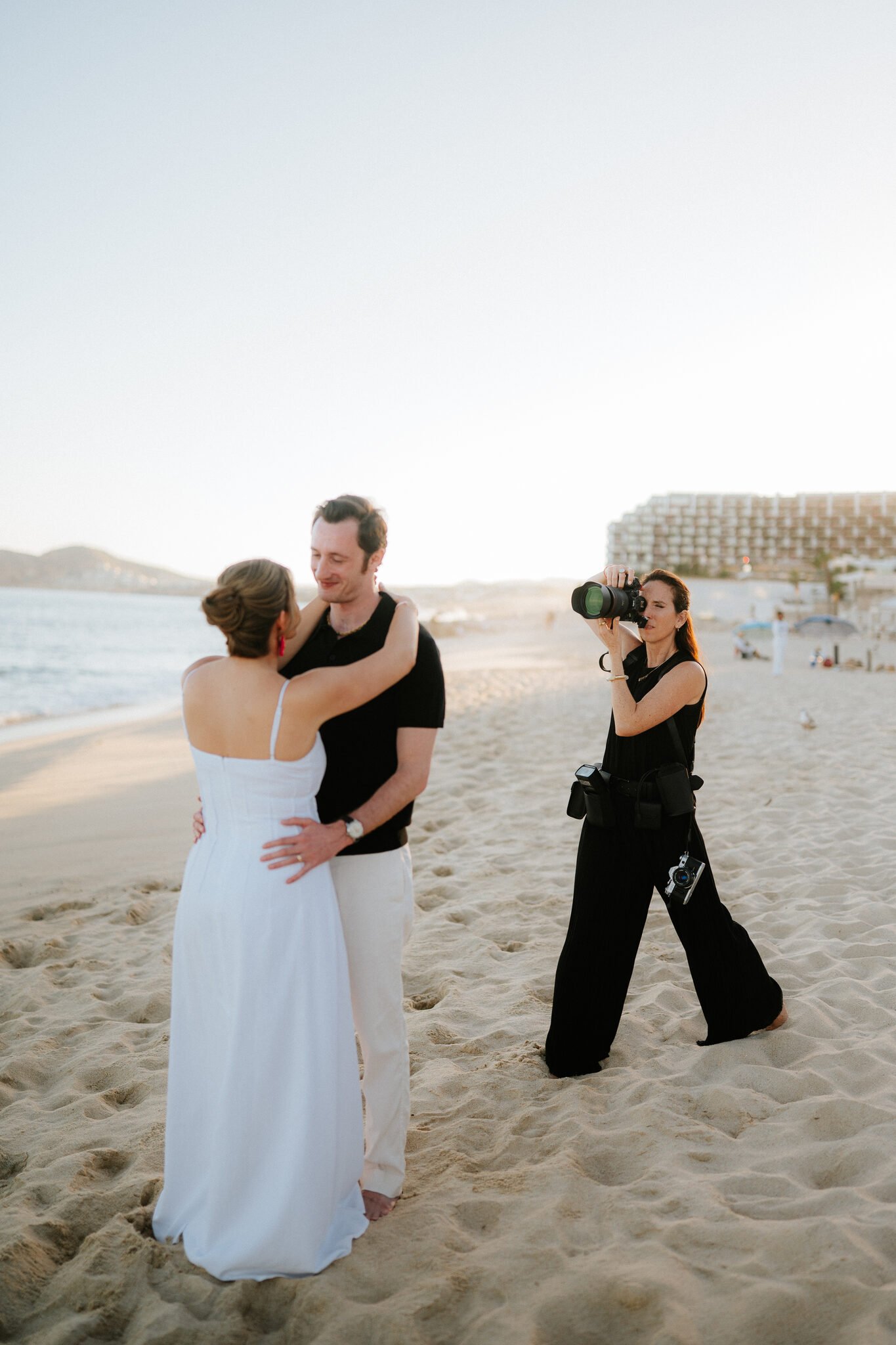 Wedding photographer capturing a couple on the beach in Cabo San Lucas