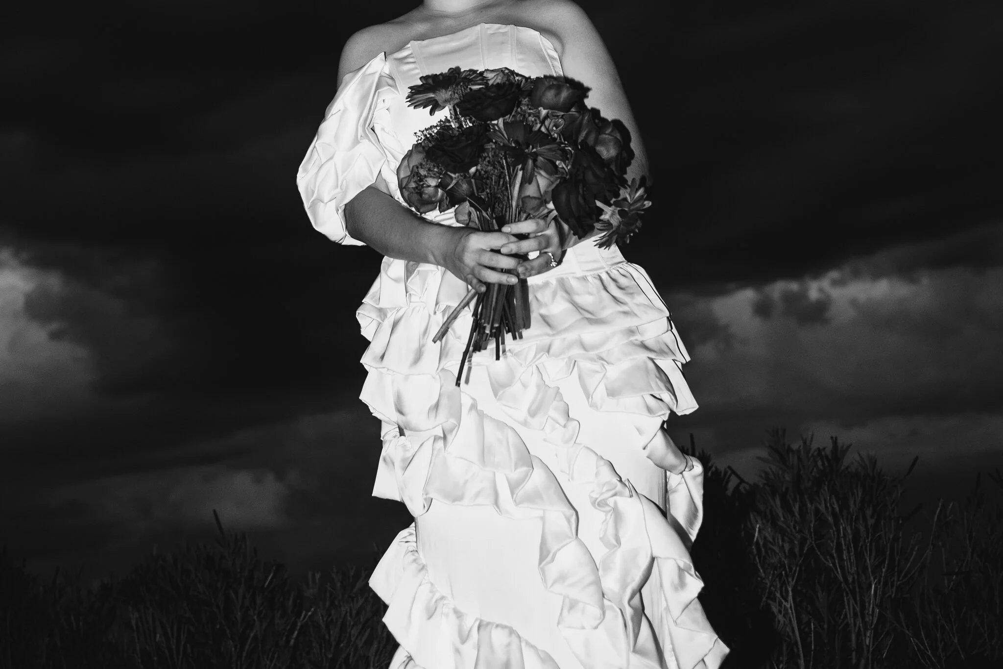 Bride holding her bouquet direct flash