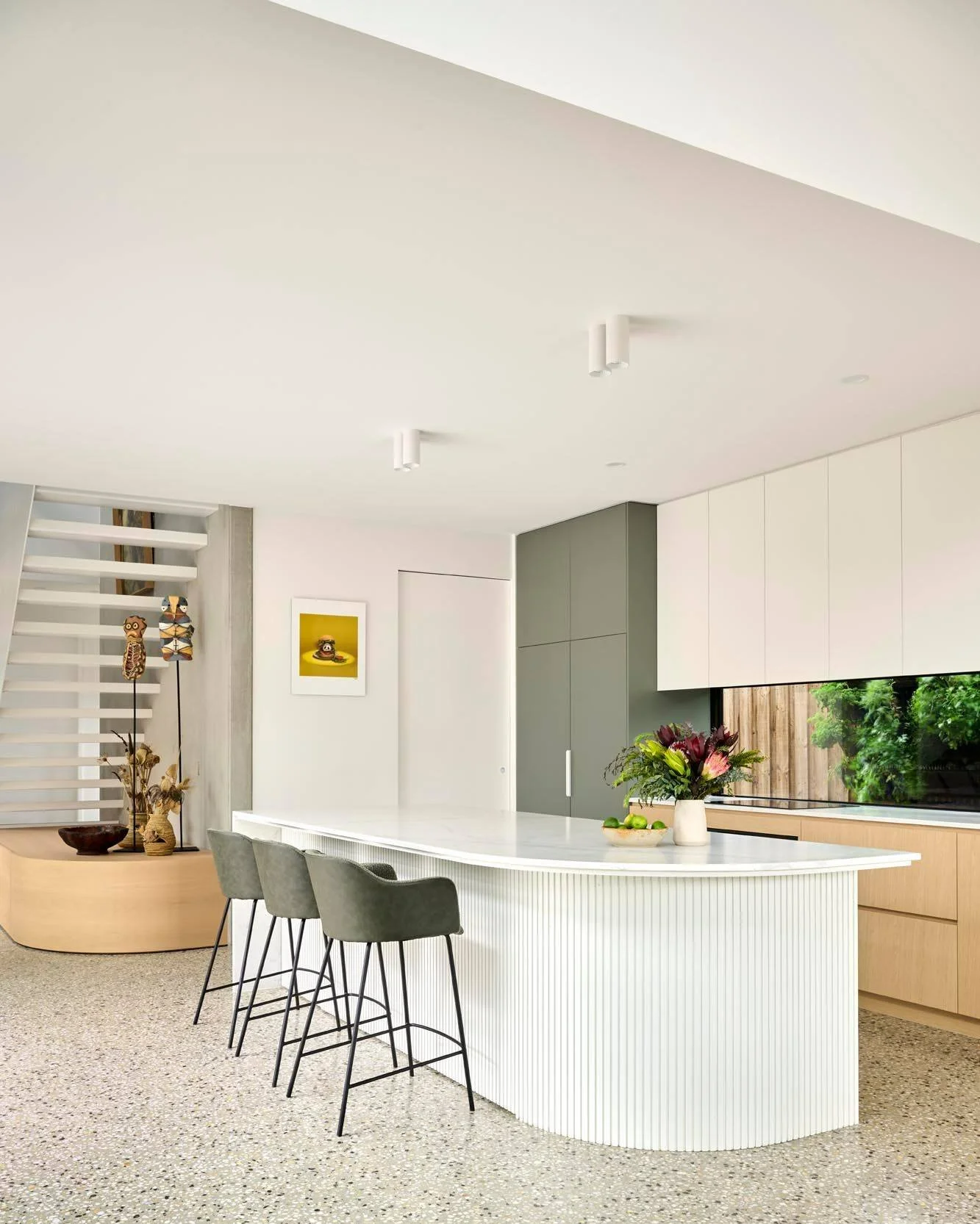 Sundial House 

The internal program was designed as a livable gallery centred on a light-filled courtyard. For the clients, passionate art collectors, the home was designed to showcase their playful collection. Double-height concrete walls, integrat